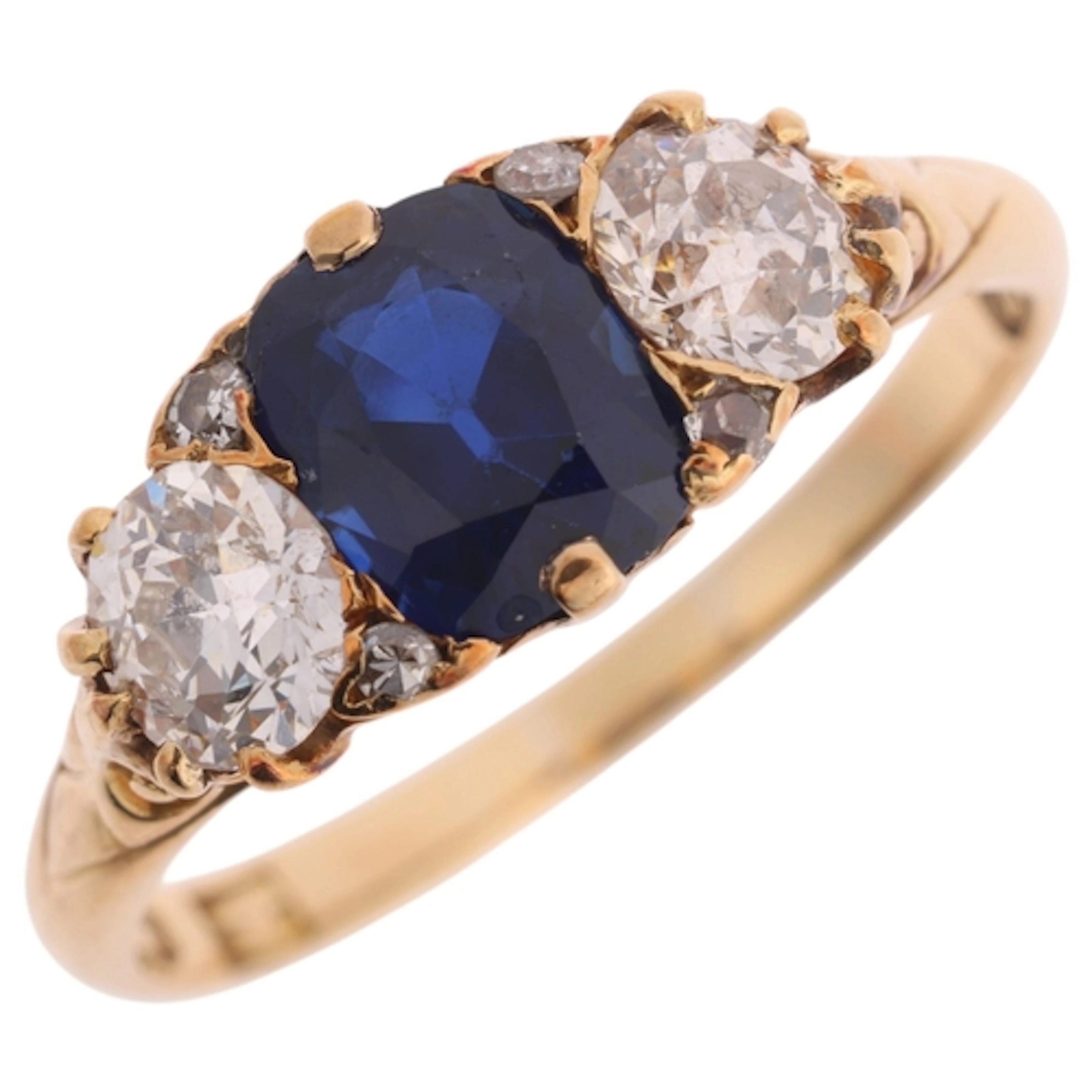 An Antique 18ct gold three stone sapphire and diamond half h...