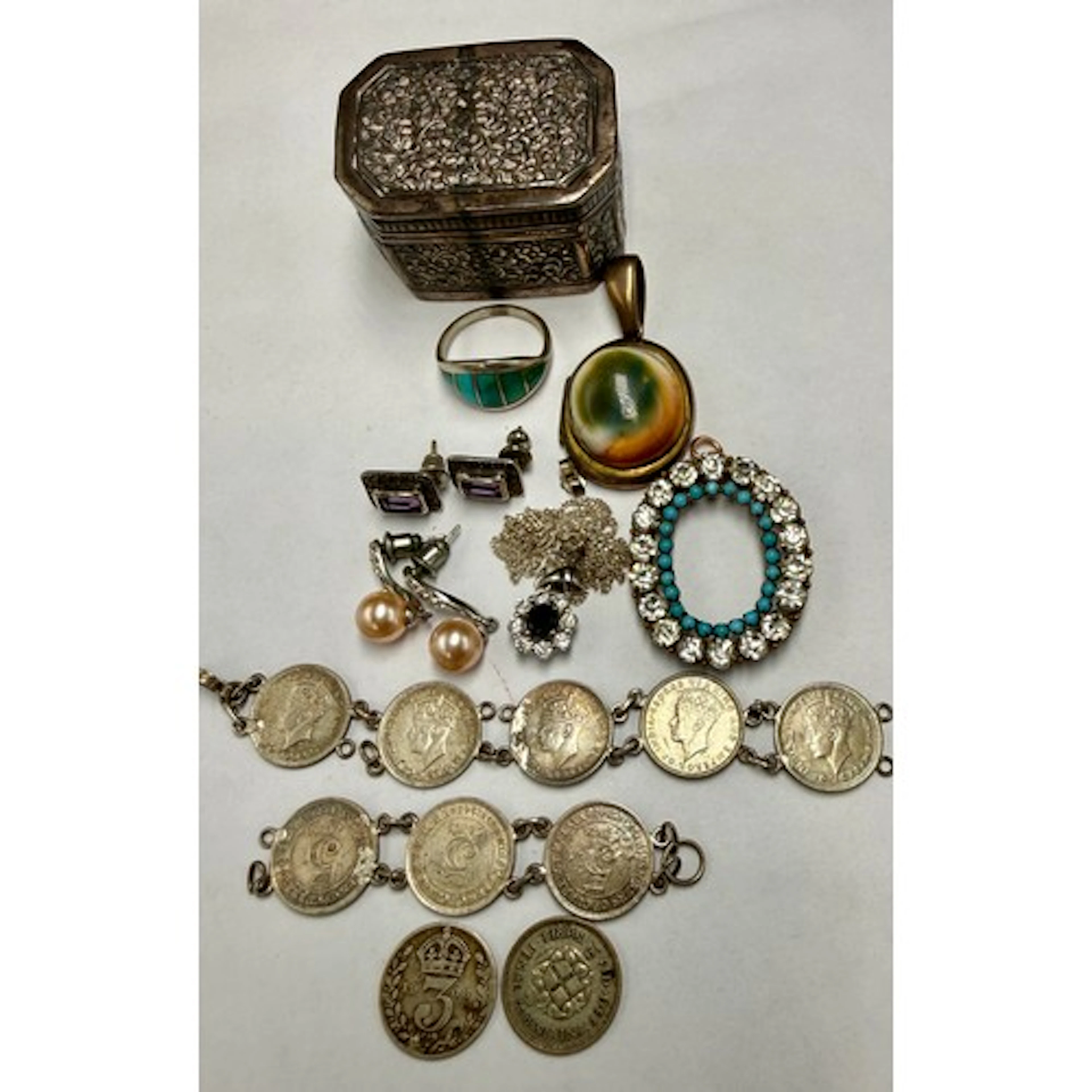 A collection of costume jewellery to include sterling silver...