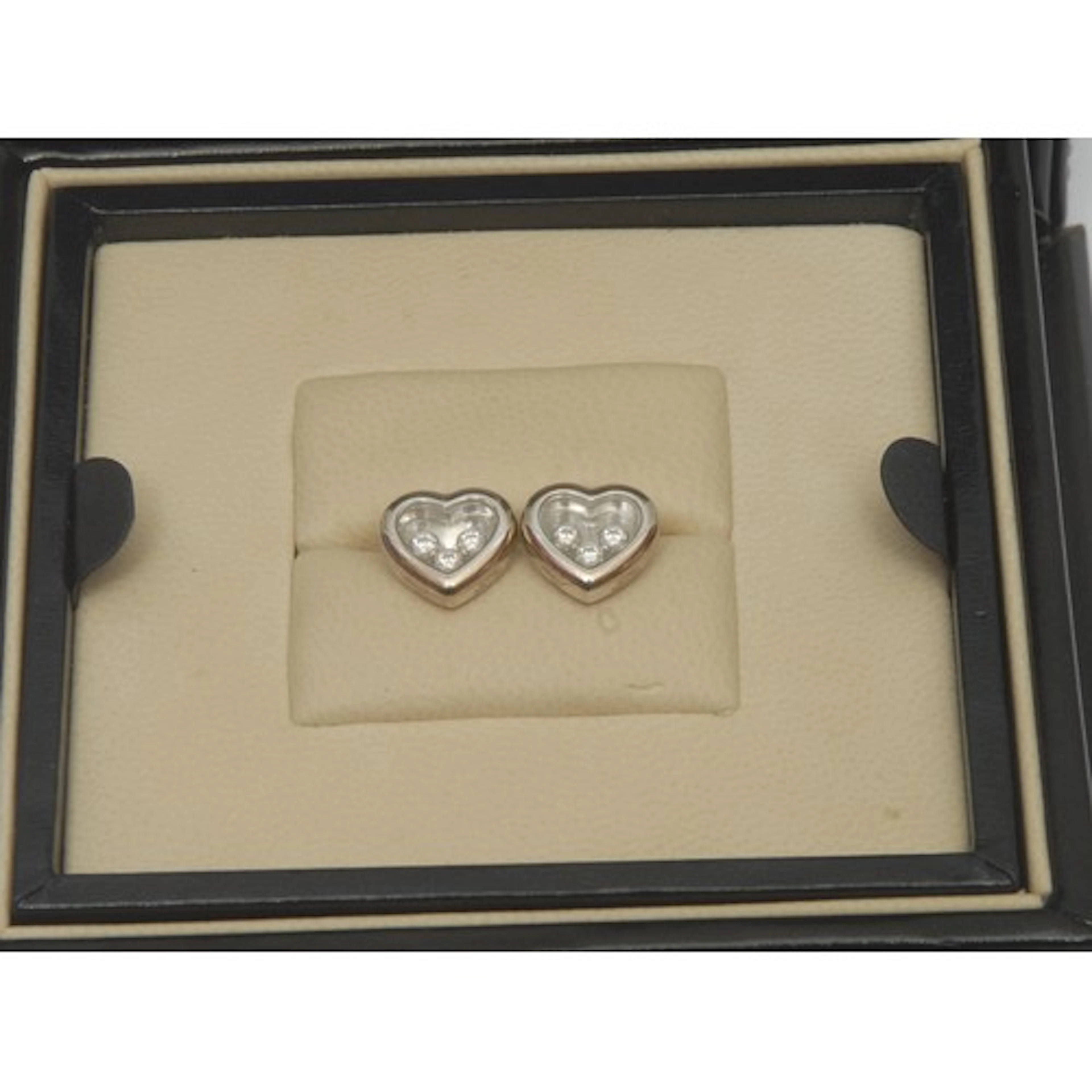 Chopard - a pair of 18ct white gold heart shaped Happy Diamo...