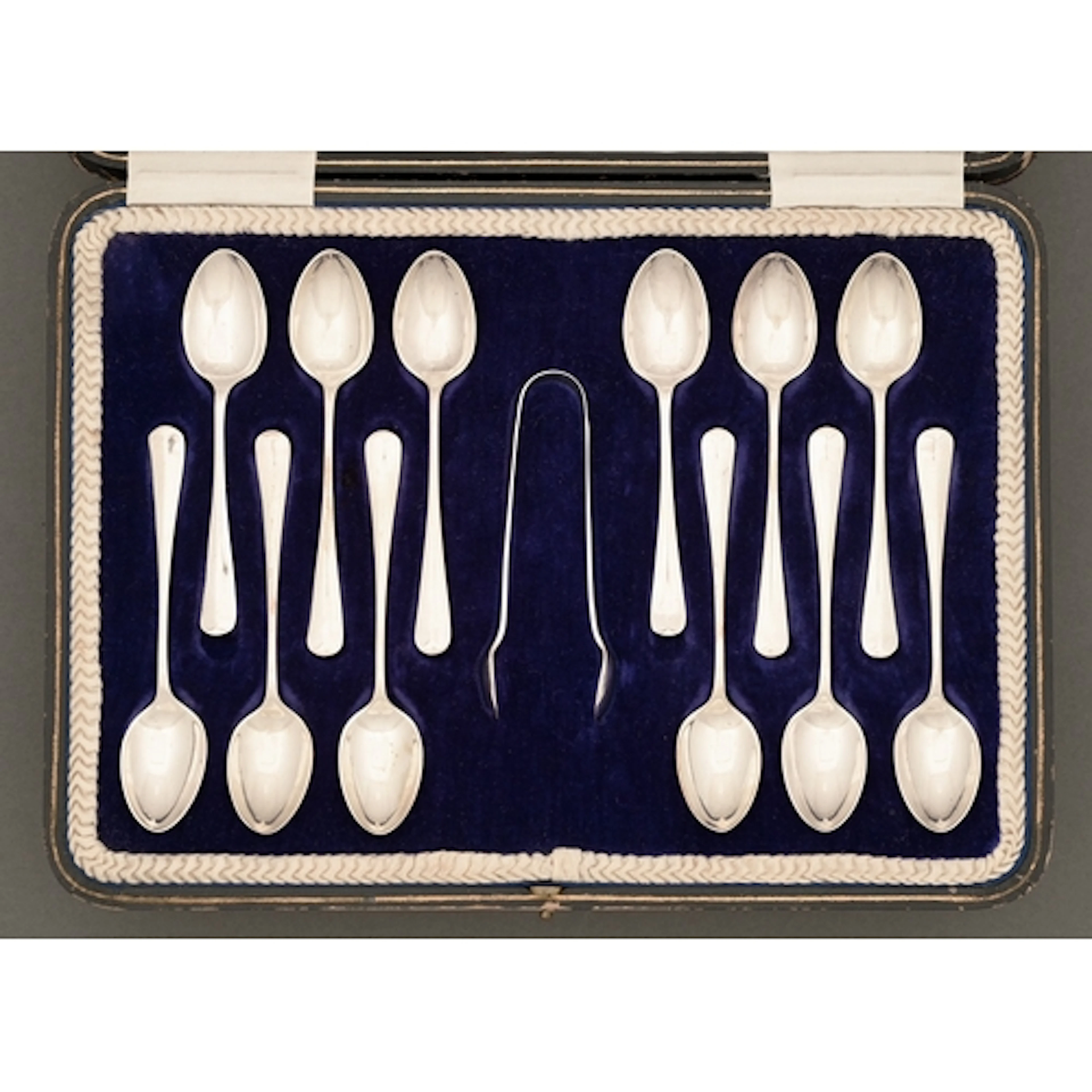 A set of twelve George V silver coffee spoons and pair of su...