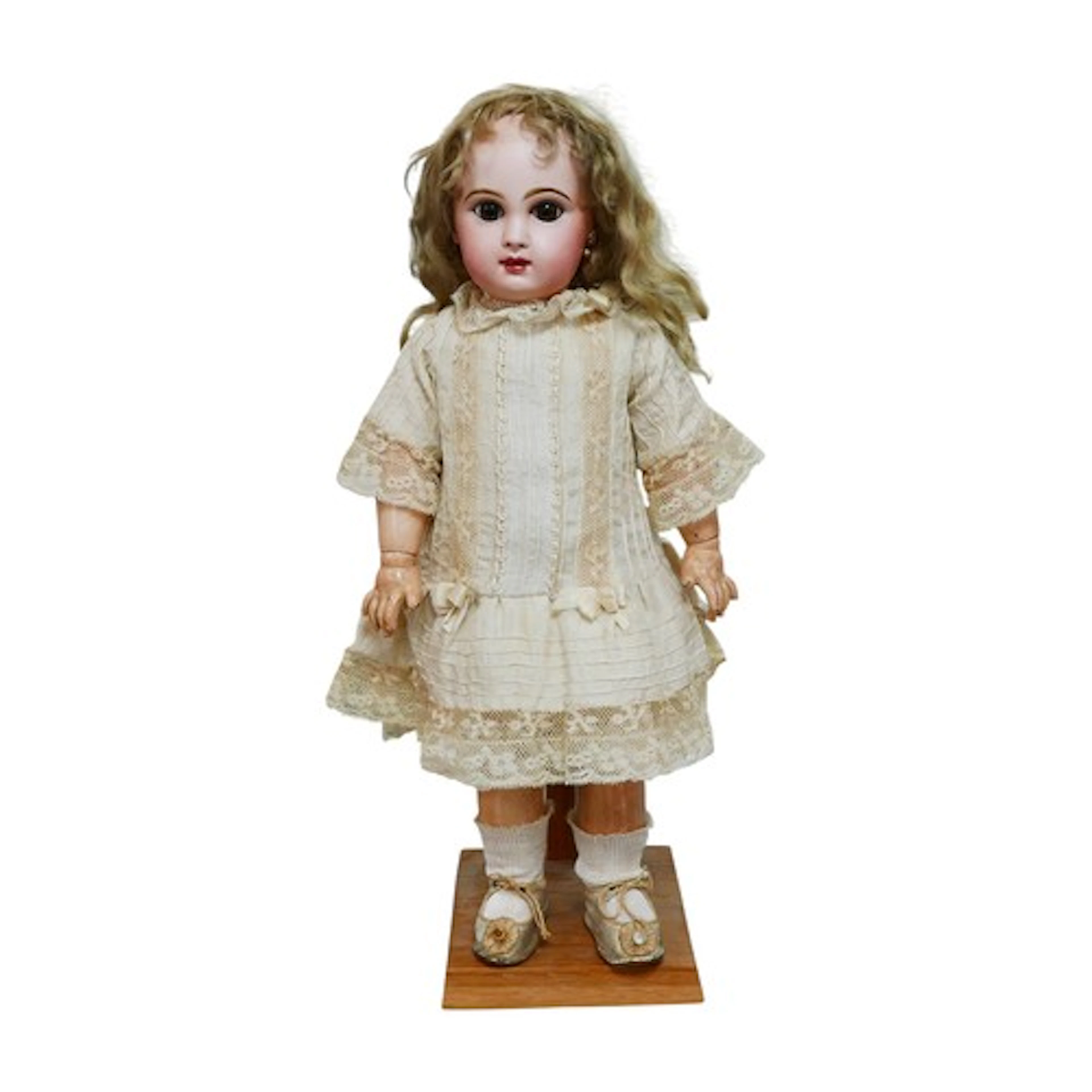 A bisque headed Jumeau doll, with glass eyes, hand painted e...