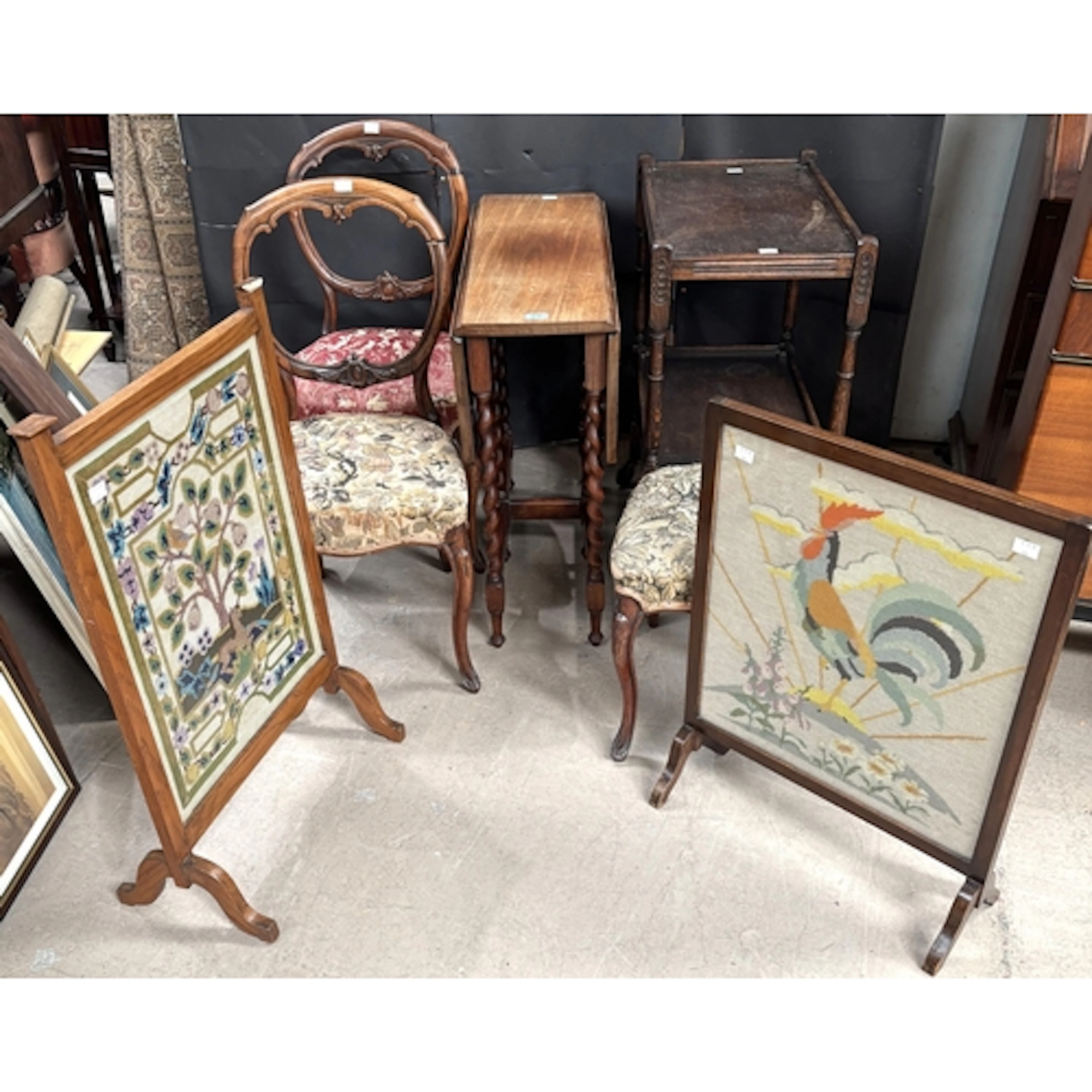 An early 20th century fire screen, another fire screen in Ar...