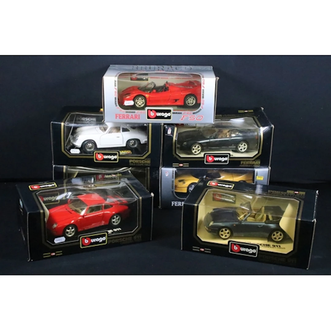 Seven boxed 1/18 Burago Diamonds diecast models to include P...