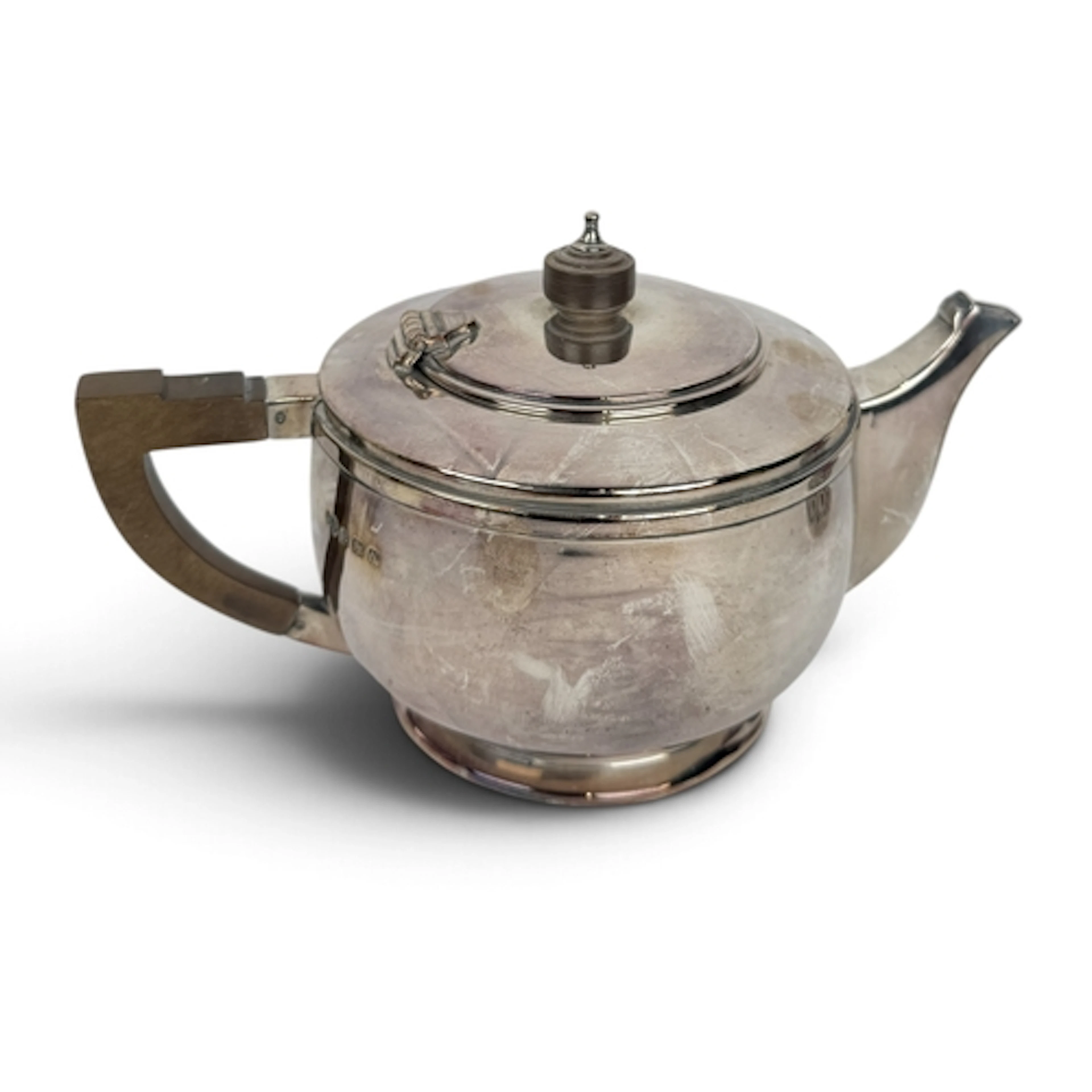AN ART DECO CIRCULAR SILVER TEAPOT, DEAKIN & FRANCIS, BI...