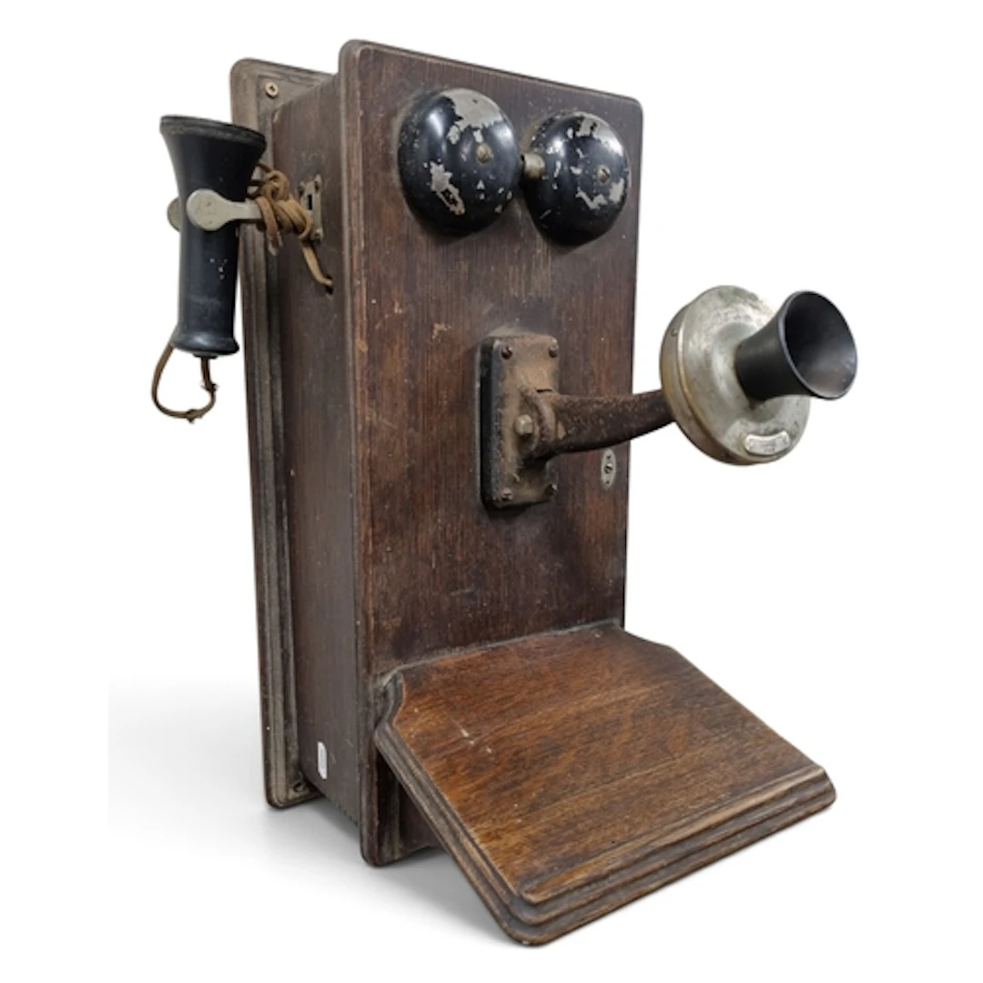An early 20th Century wall mounted Timber Crank Telephone. ...