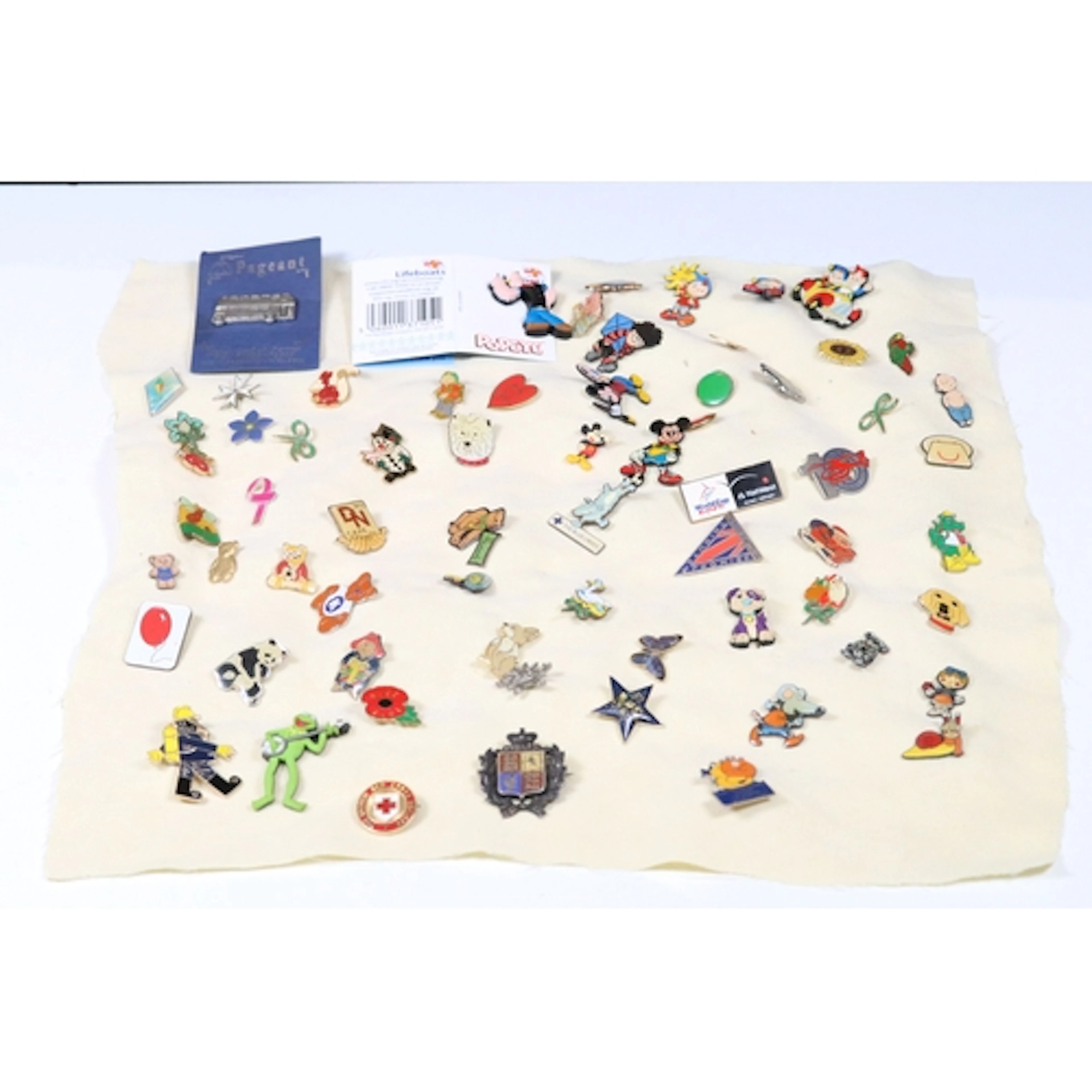 Collection of pin badges to include Walt Disney, Noddy, Denn...