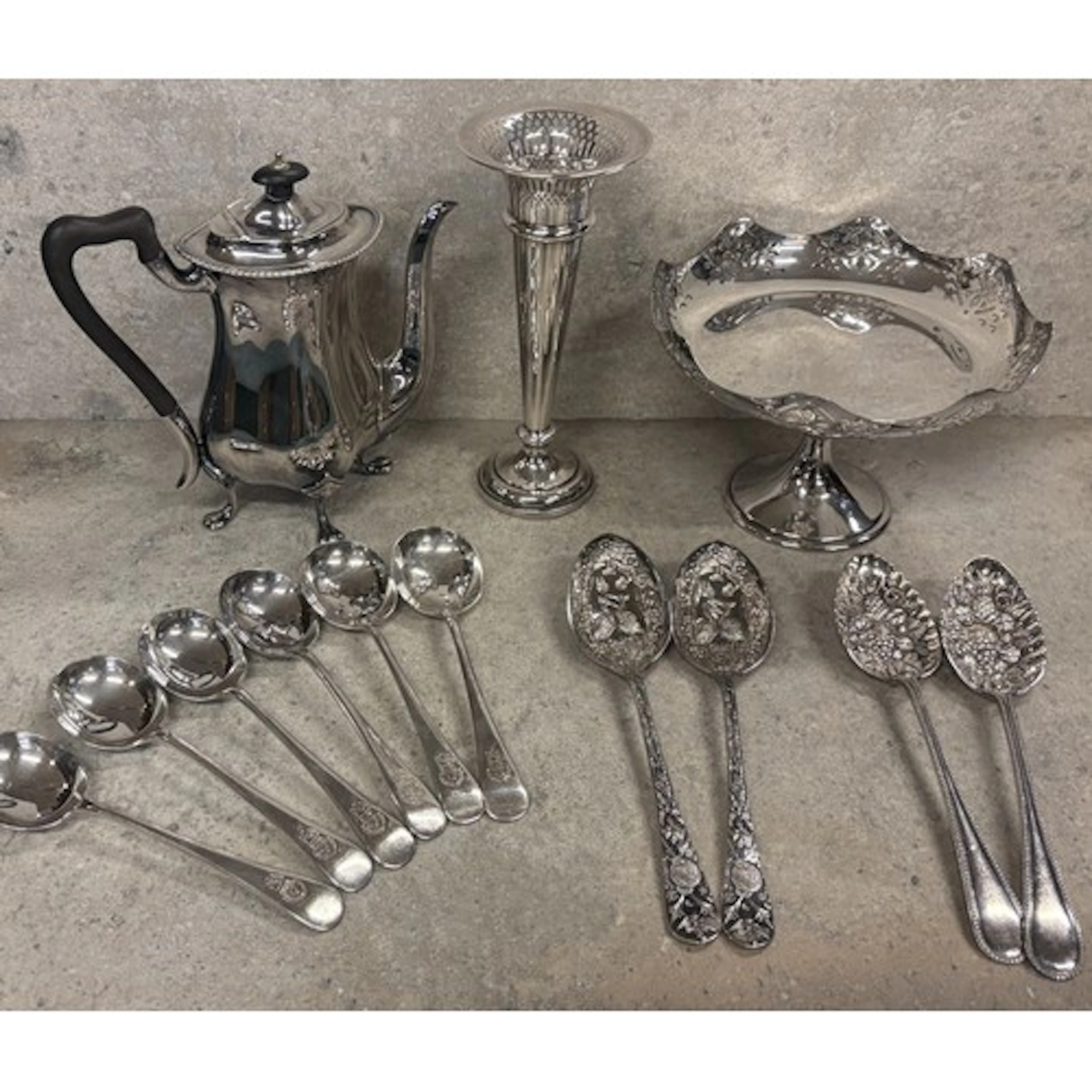 Two pairs of silver-plated berry spoons together with a set ...