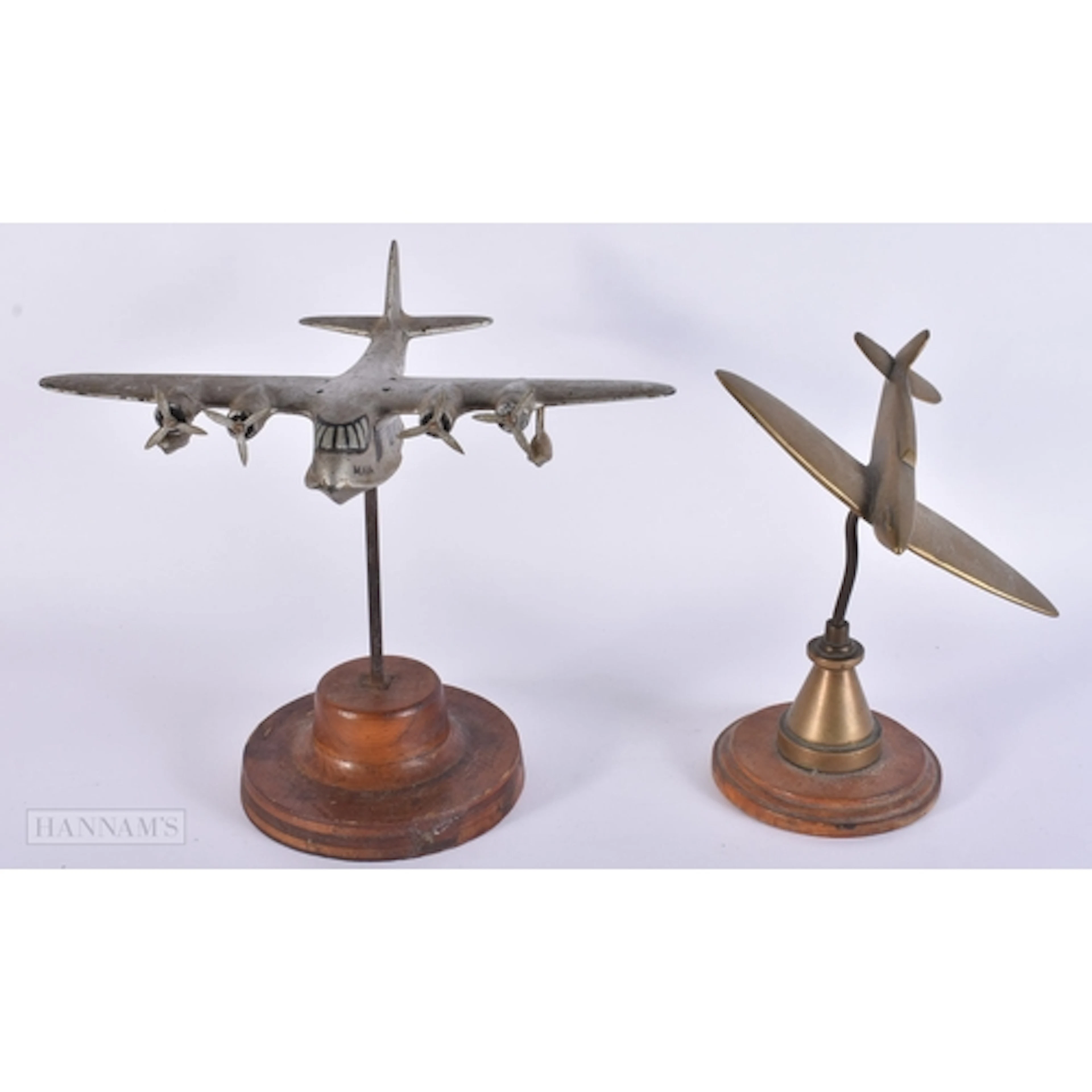 A WWII TRENCH ART SPITFIRE together with another painted pla...