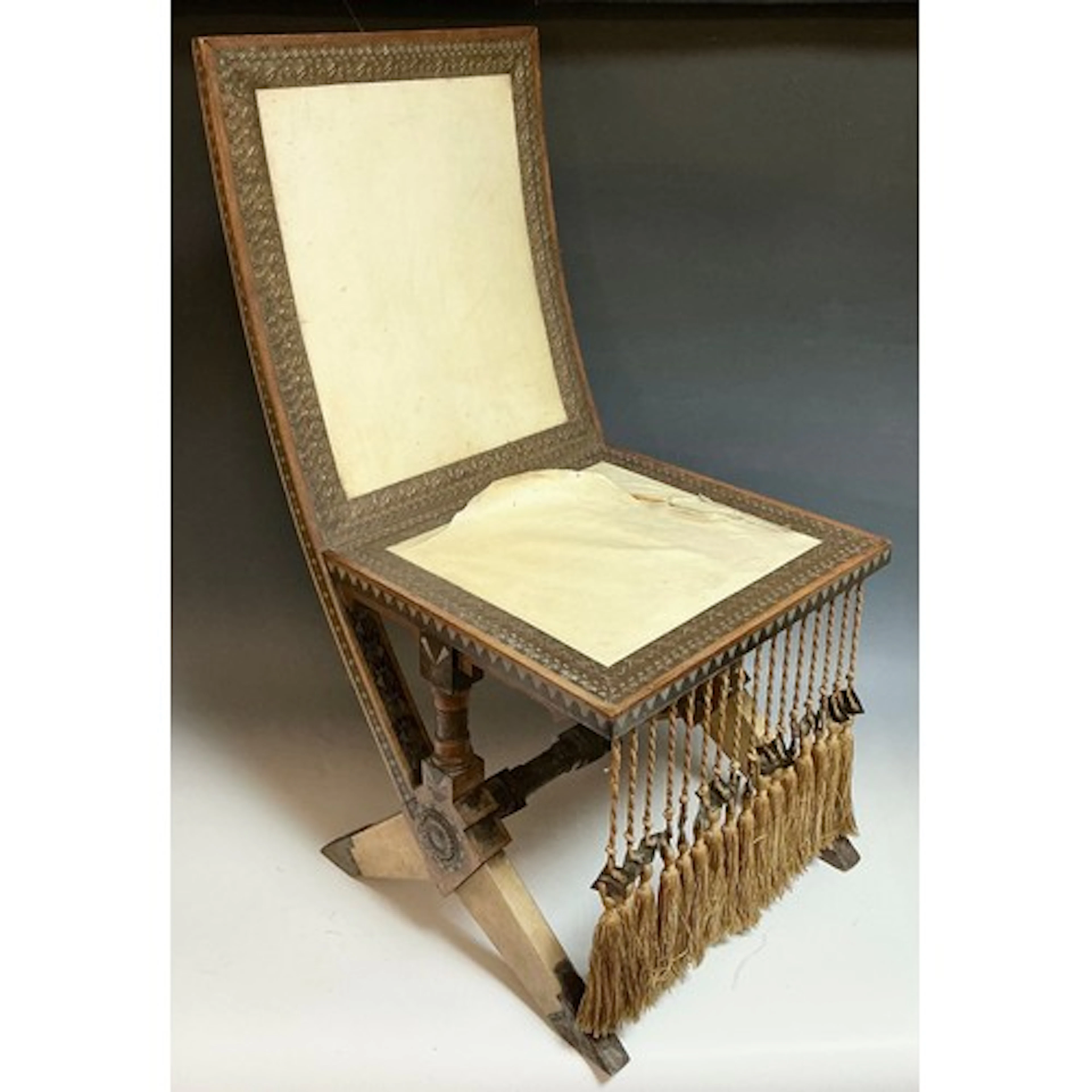 An Italian walnut and marquetry side chair, attributed to Ca...