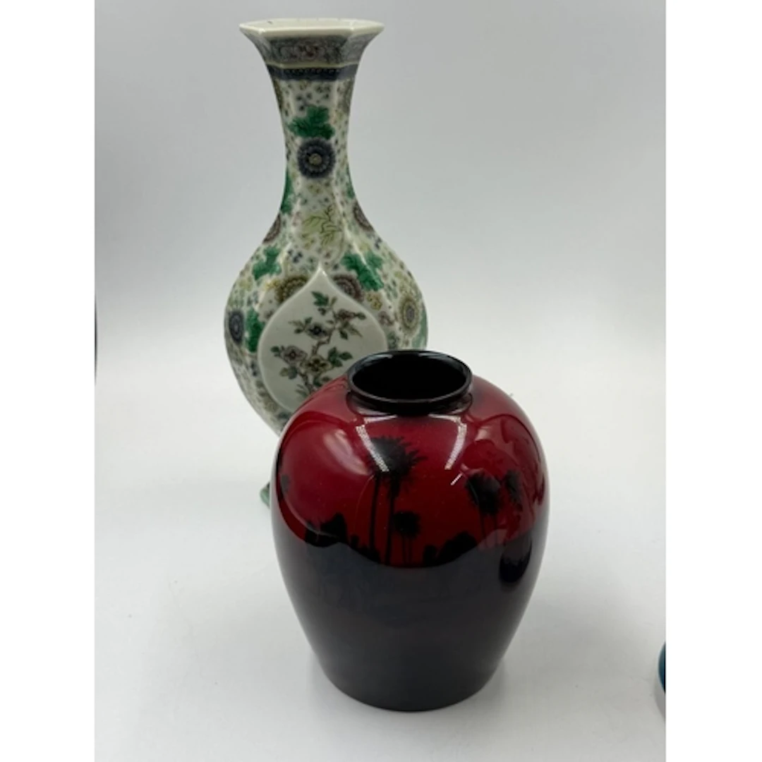 A Royal Doulton Flambe vase along with a porcelain decorated...