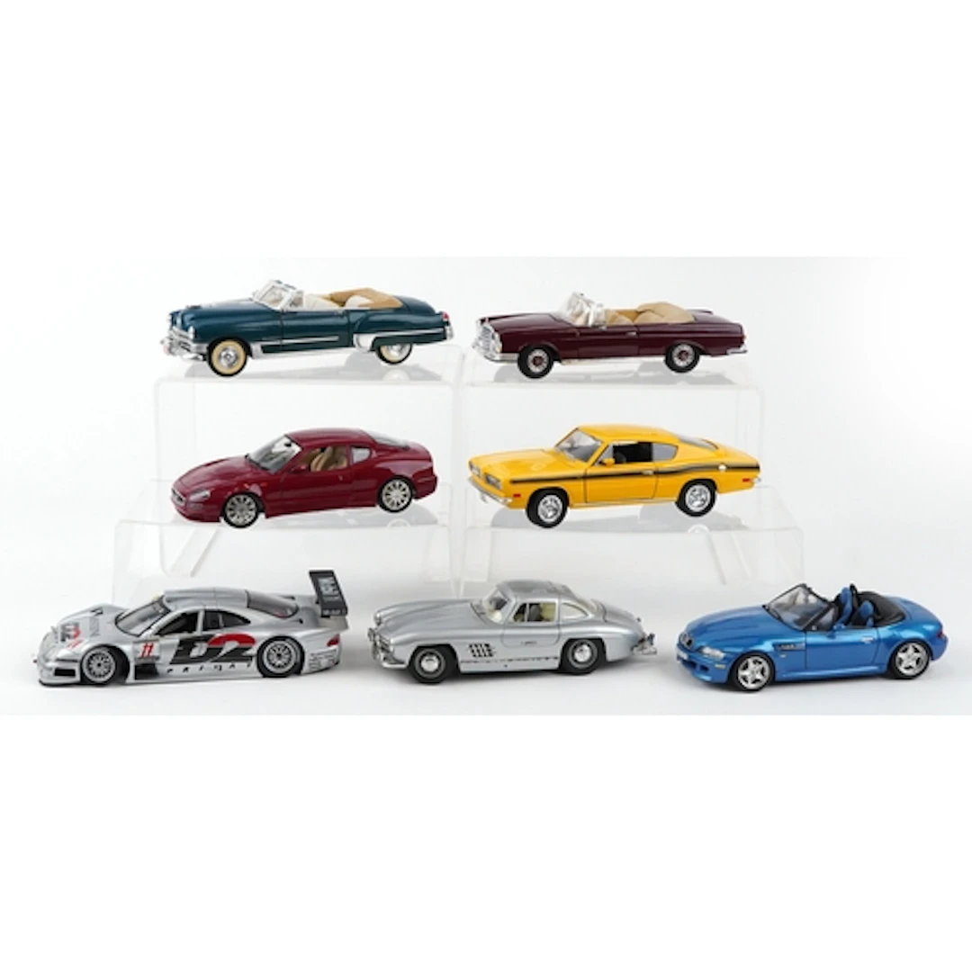 Seven 1/18 scale diecast collector's vehicles including 1969...