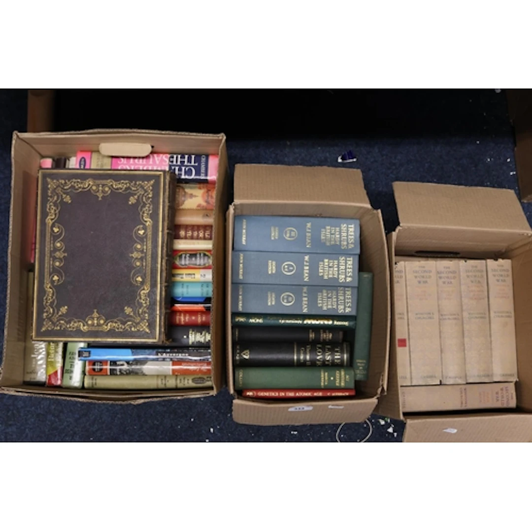 Three boxes of mixed books to include a leather Holy Bible, ...