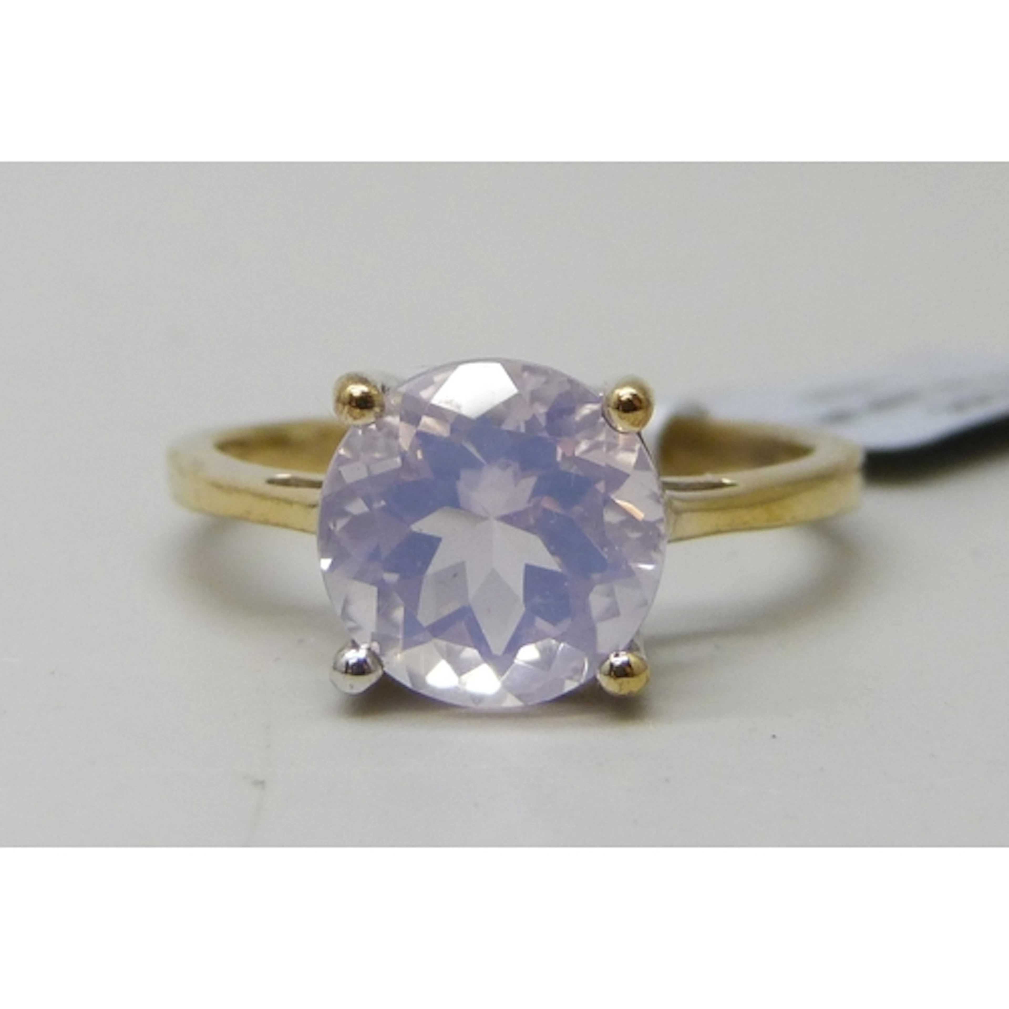A TGGC silver gilt lavender quartz ring, U
