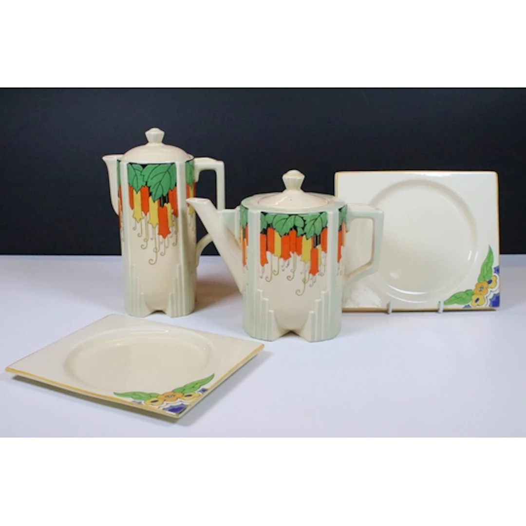 Pair of Clarice Cliff The Biarritz Bizarre plates, of square...