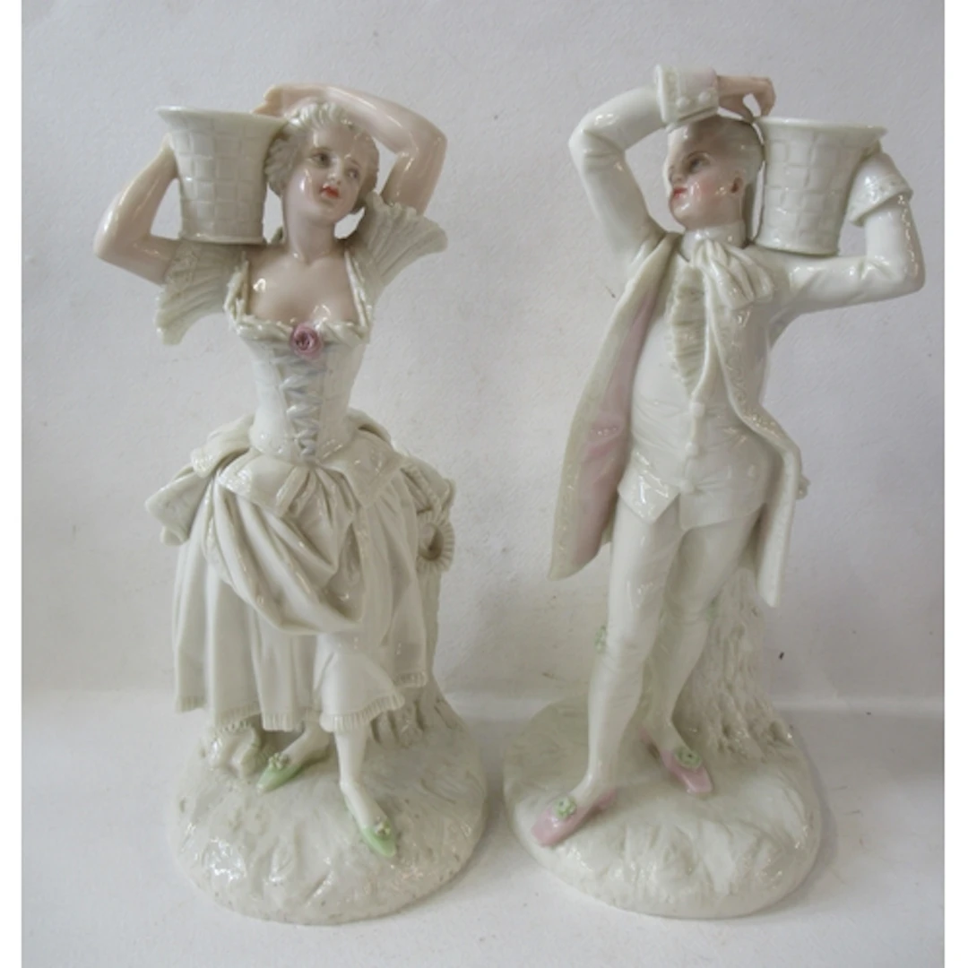 A pair of 19th century Royal Worcester candlesticks, formed ...