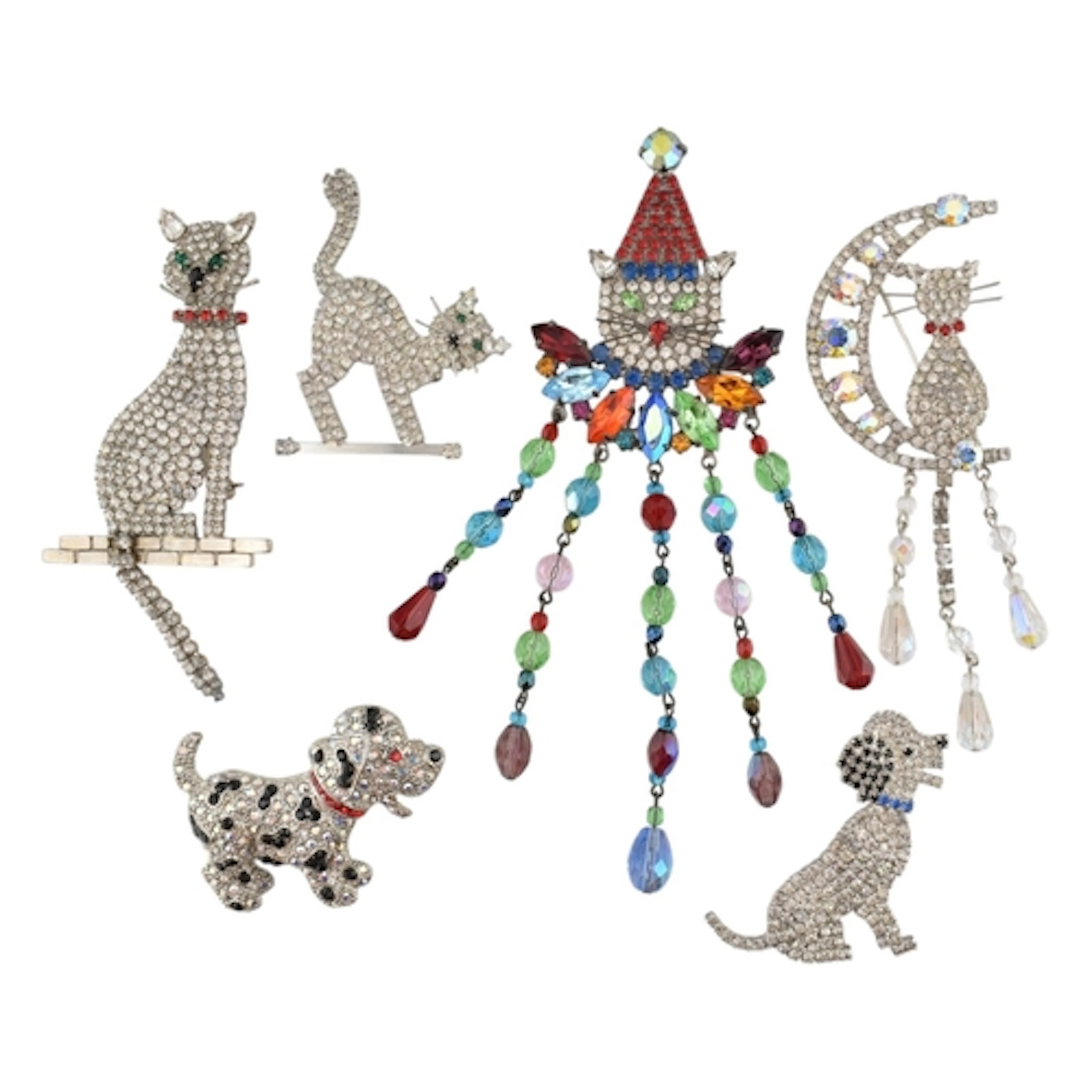 A selection of Butler and Wilson brooches. To include two do...