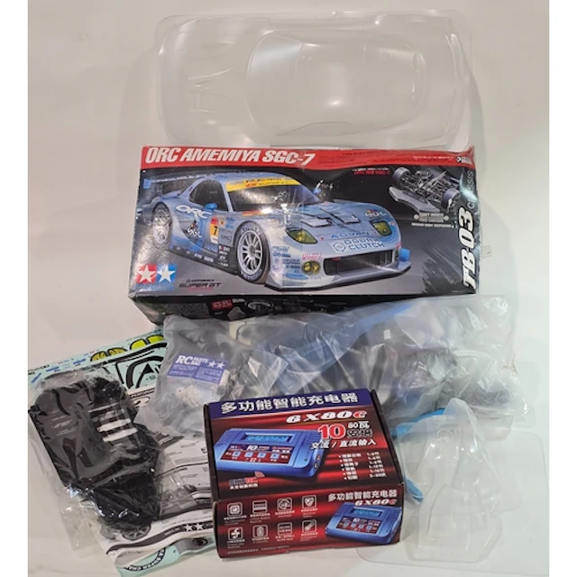 A Tamiya Orc Amemiya SGC-7 RC Radio Controlled car kit. This...