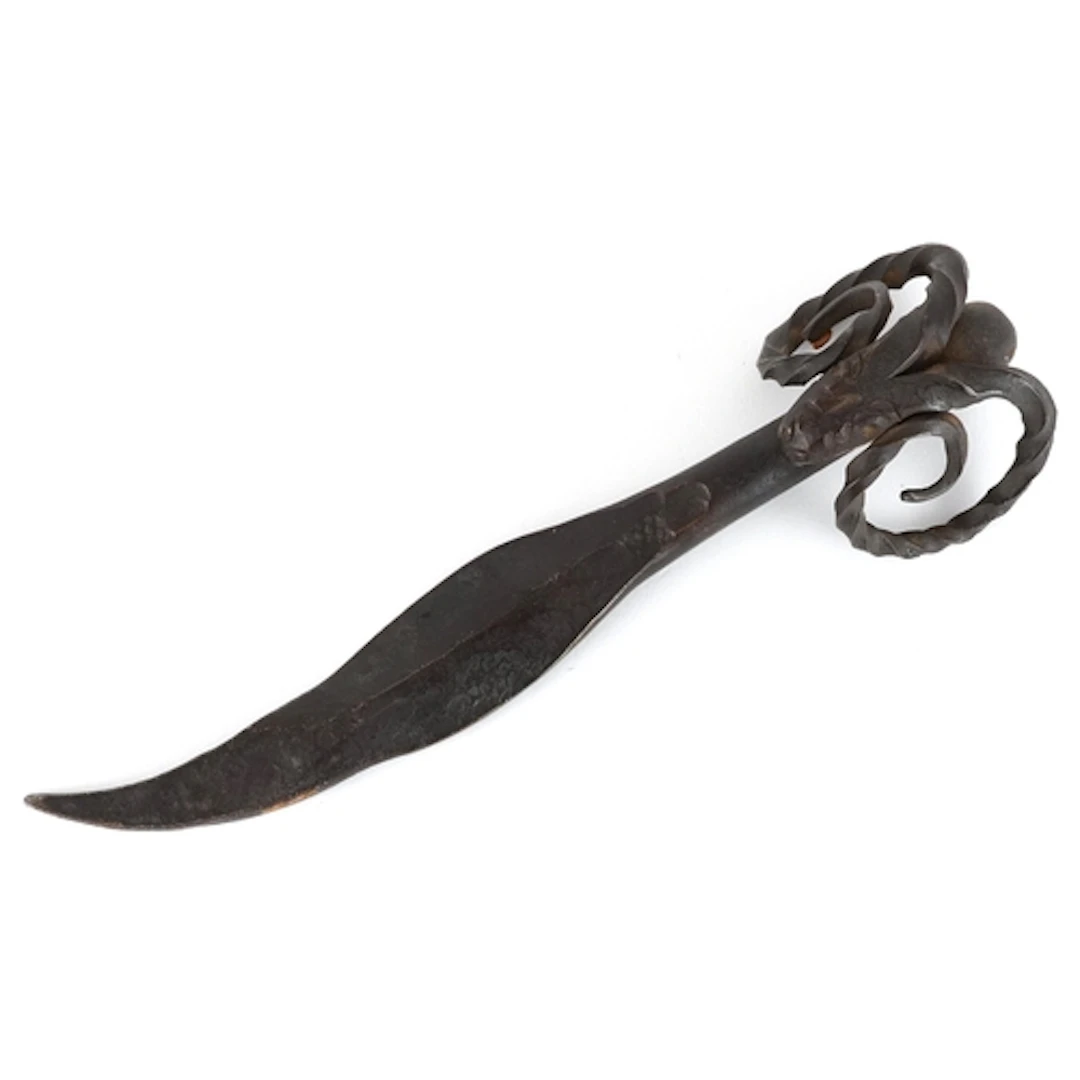 Patinated bronze letter opener in the form of a ram's head, ...