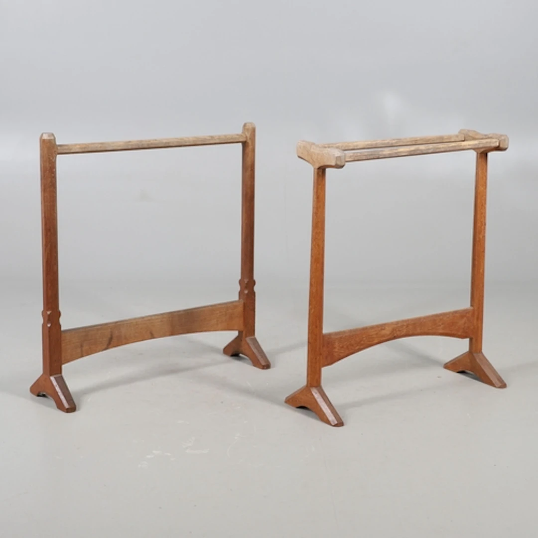 GORDON RUSSELL - TWO COTSWOLD SCHOOL TOWEL RAILS. Circa 1920...