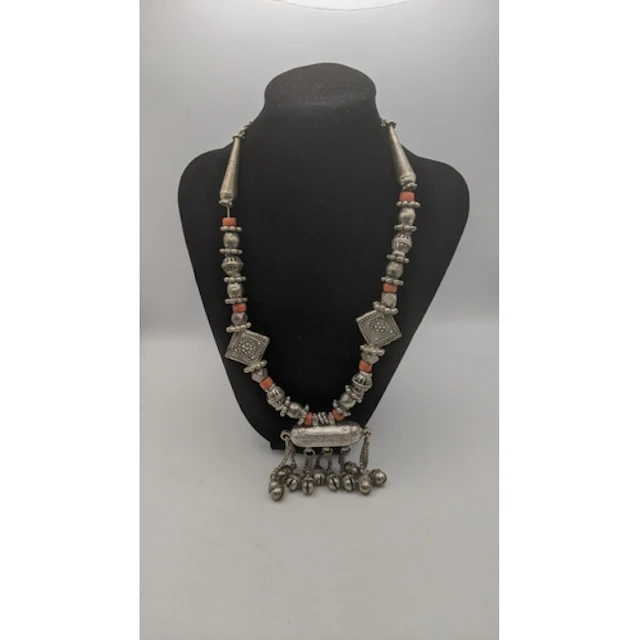 An early 20th century Yemeni silver bead and coral necklace,...