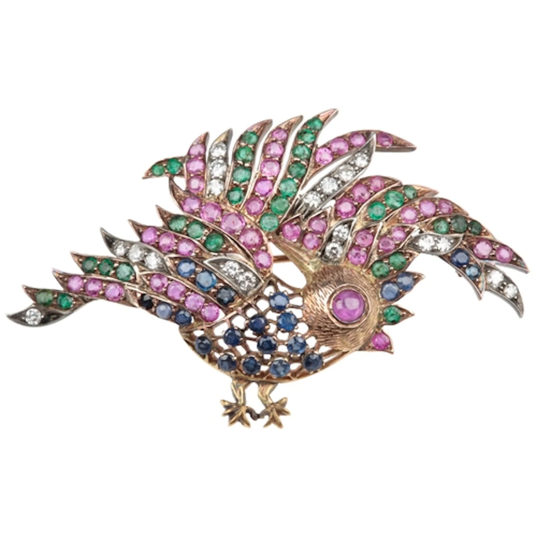 A gem-set and diamond brooch, mid 20th century, designed as ...