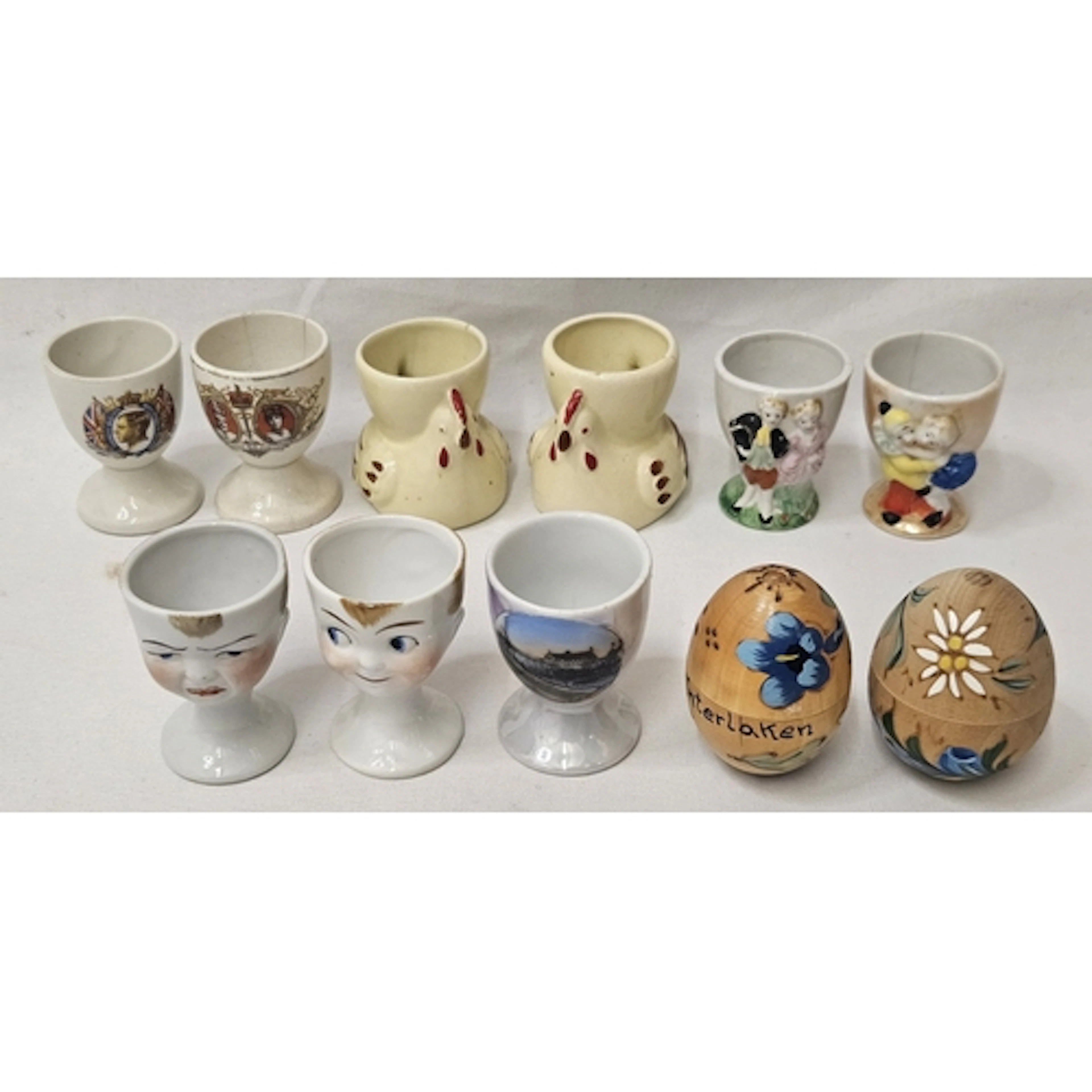 Vintage Egg Cups incl. 2 German style porcelain heads of you...