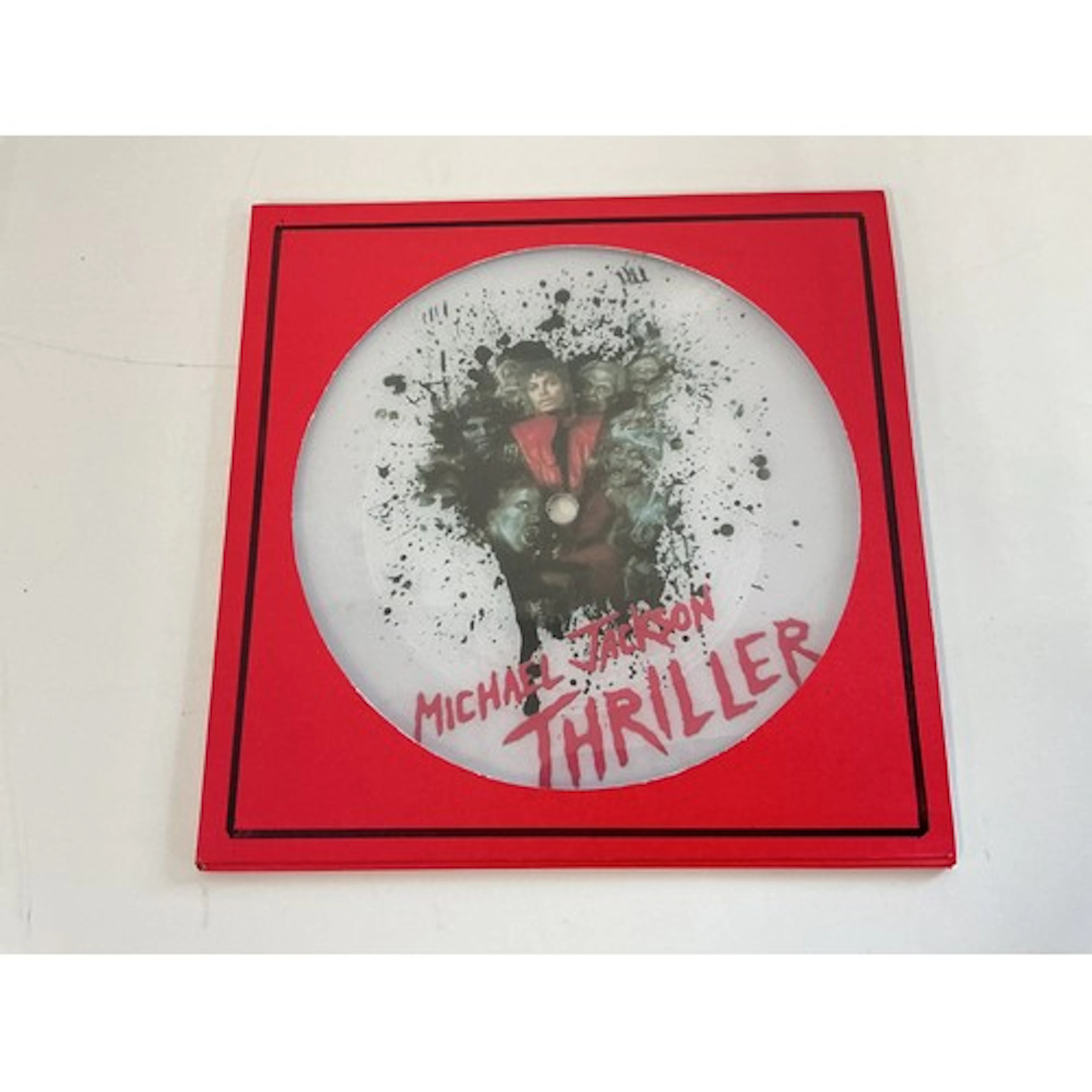 A unique Michael Jackson 7” picture disc of Thriller made as...