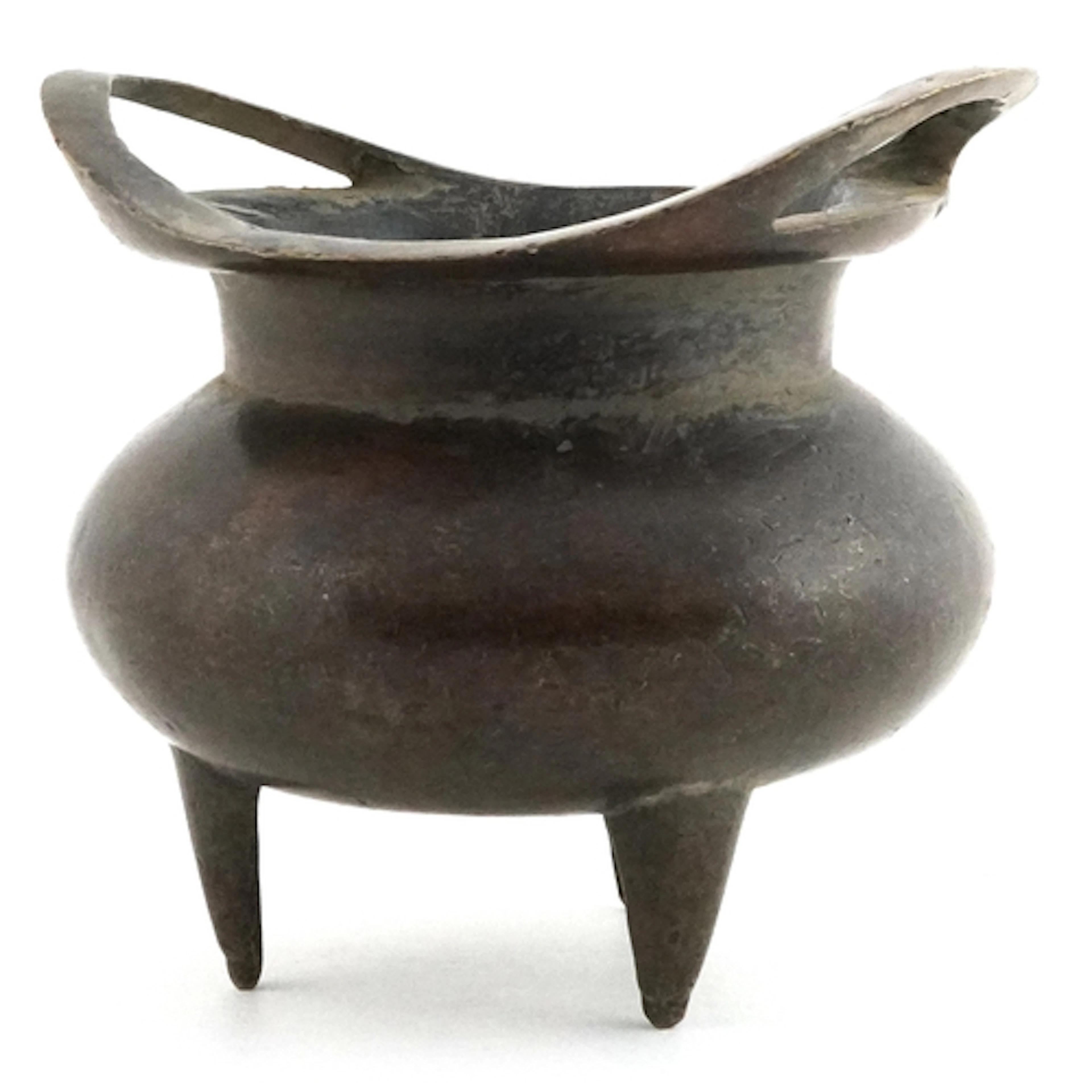 Chinese patinated bronze censer on tripod feet with twin han...