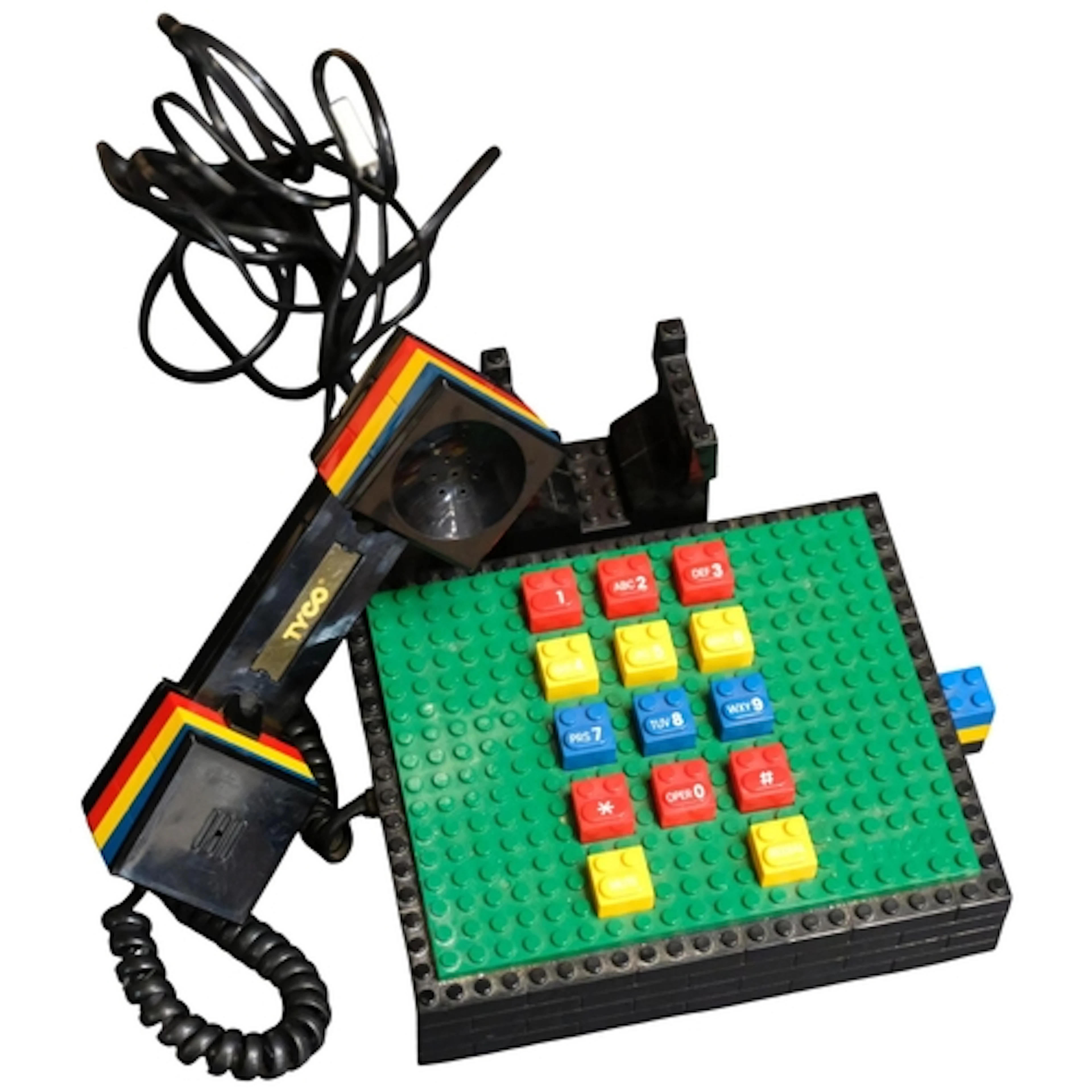 A Tyco Industries Incorporated LEGO telephone, with size dra...