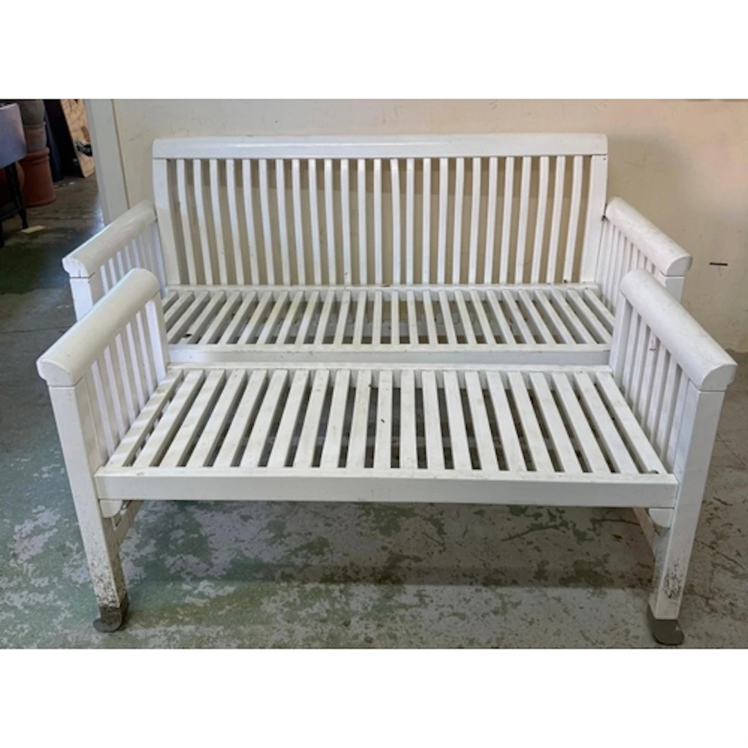 A match pair of white Kirsten Holmquist "Eden" garden benche...