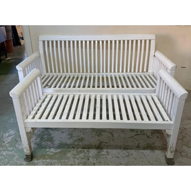 A match pair of white Kirsten Holmquist "Eden" garden benche...