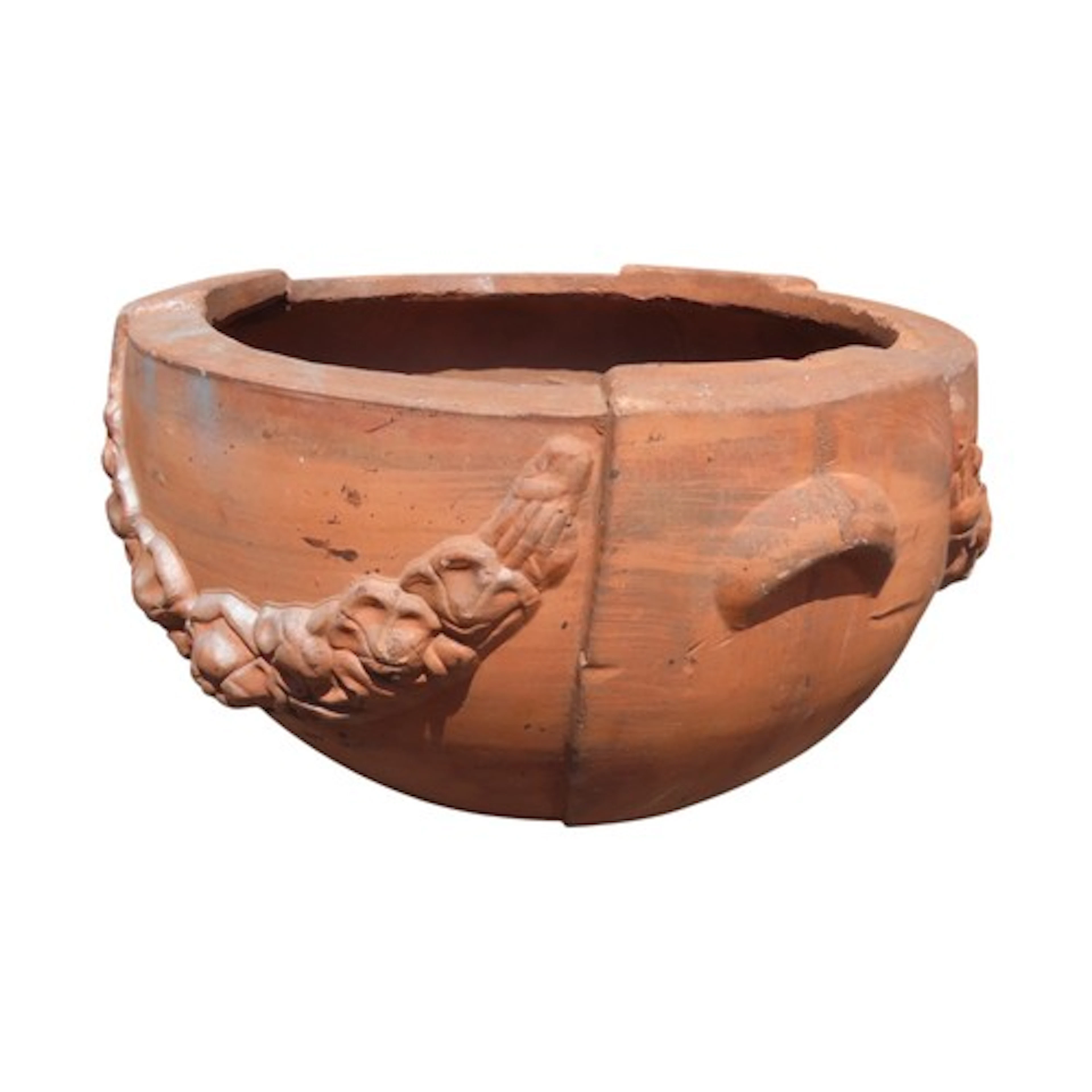 A weathered Compton style terracotta garden urn with repeati...