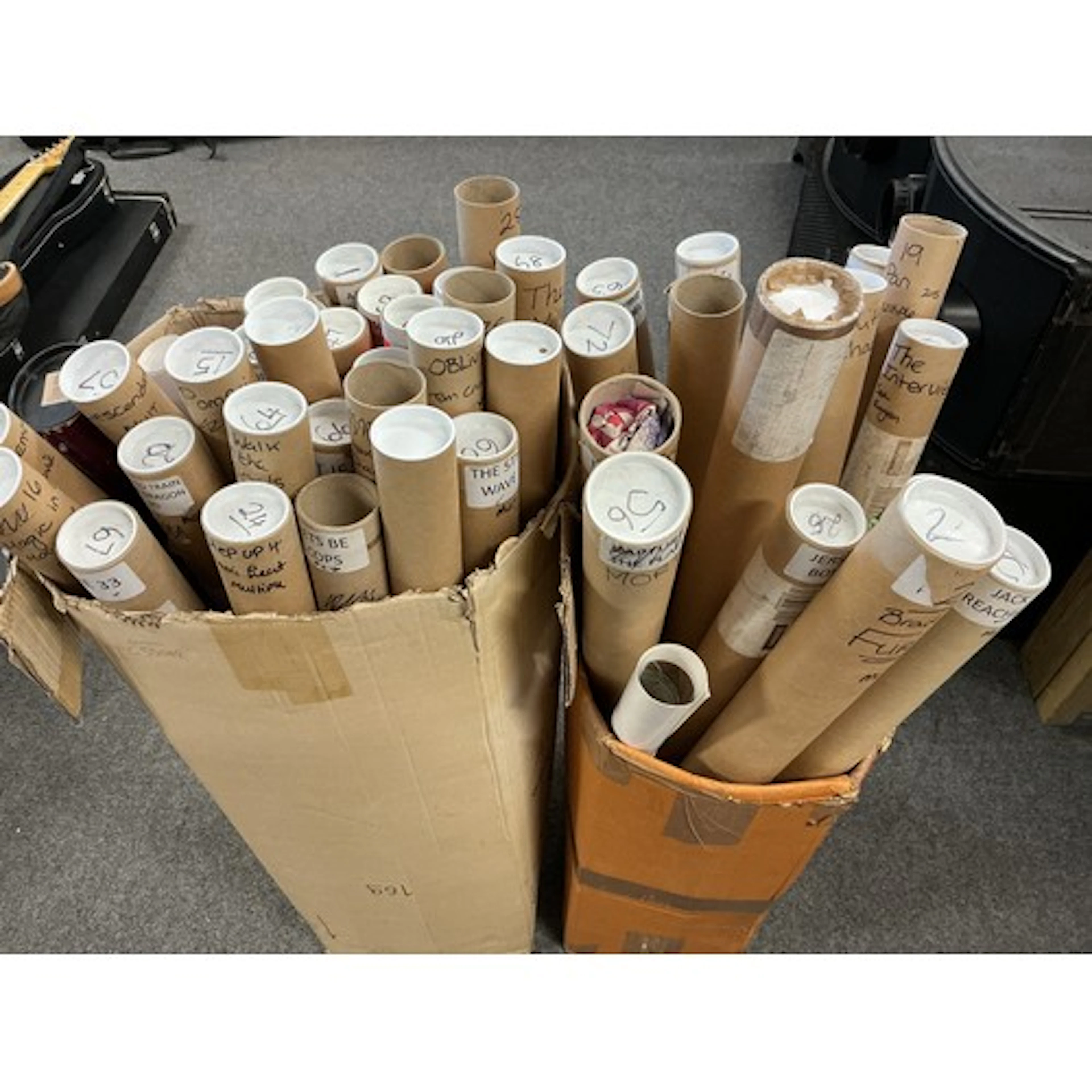 Two boxes containing a collection of film posters including ...