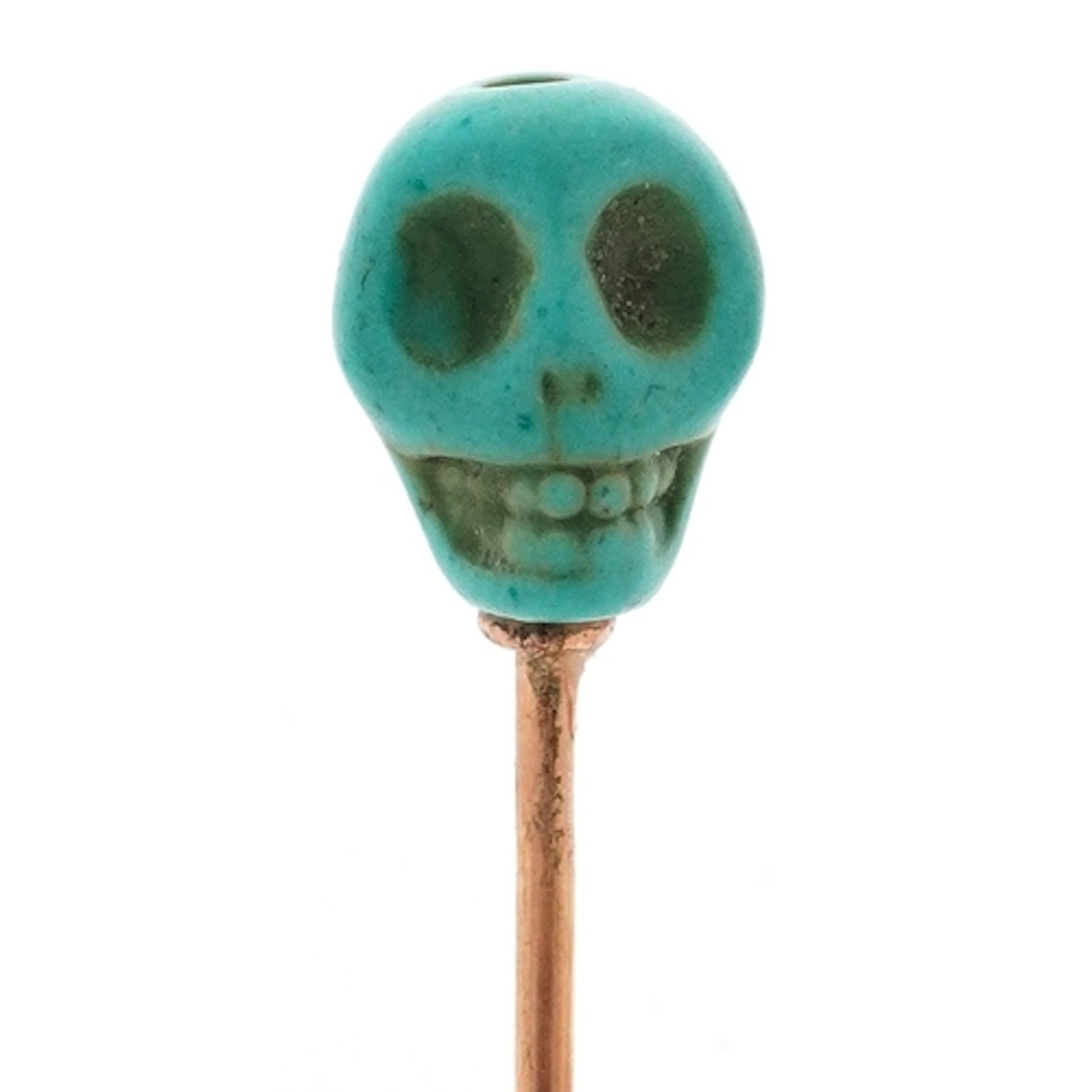 Unmarked gold turquoise skull design stickpin, 6.9cm high, 1...