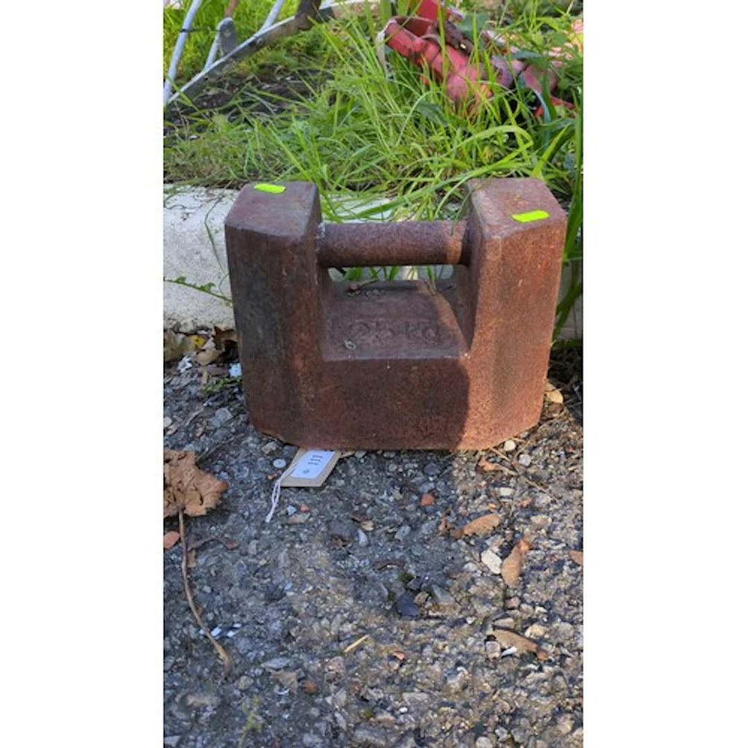 Cast-iron 25 kg scale test weight of rectangular block form,...