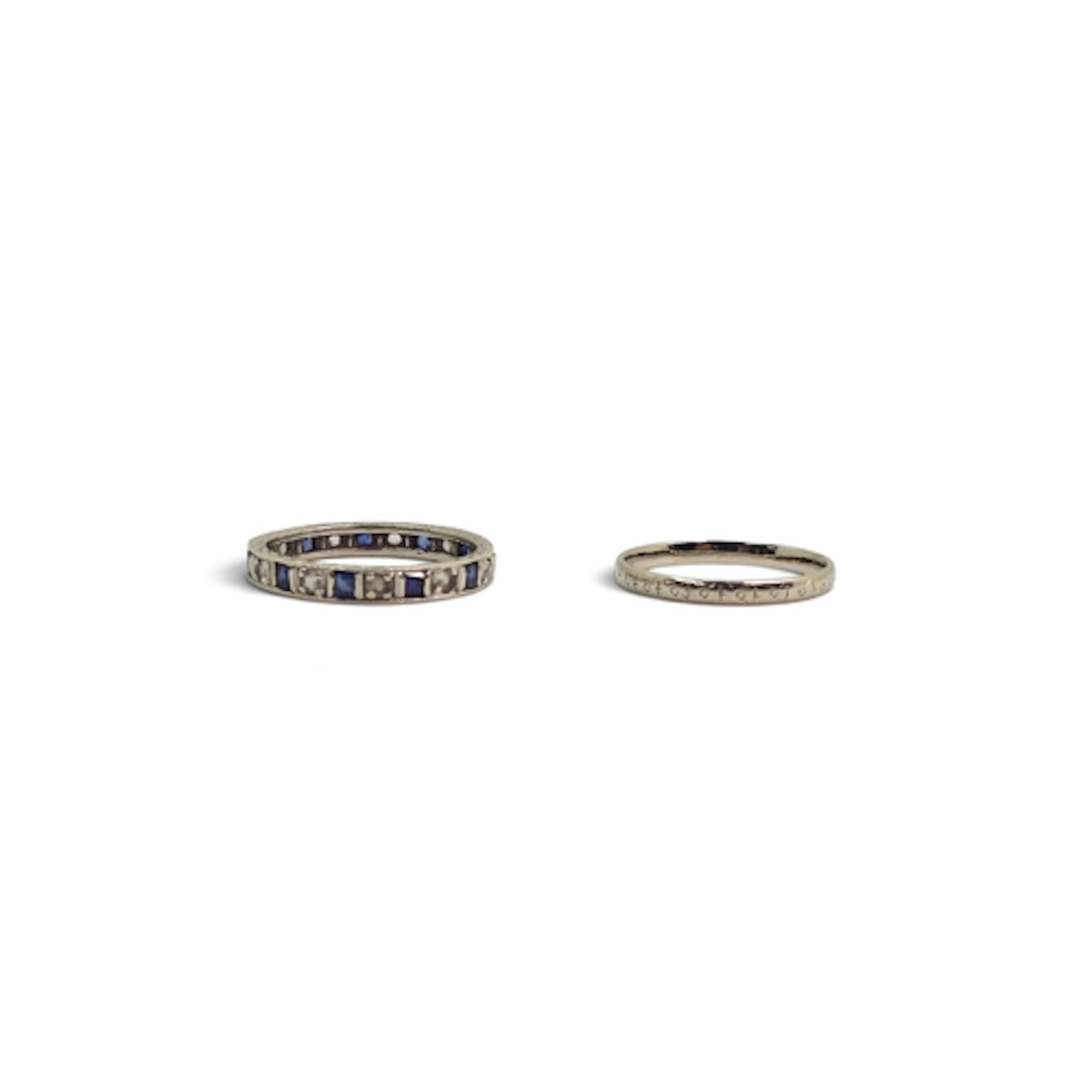 A 9ct white gold wedding ring, size L1/2, and a 9ct gold blu...
