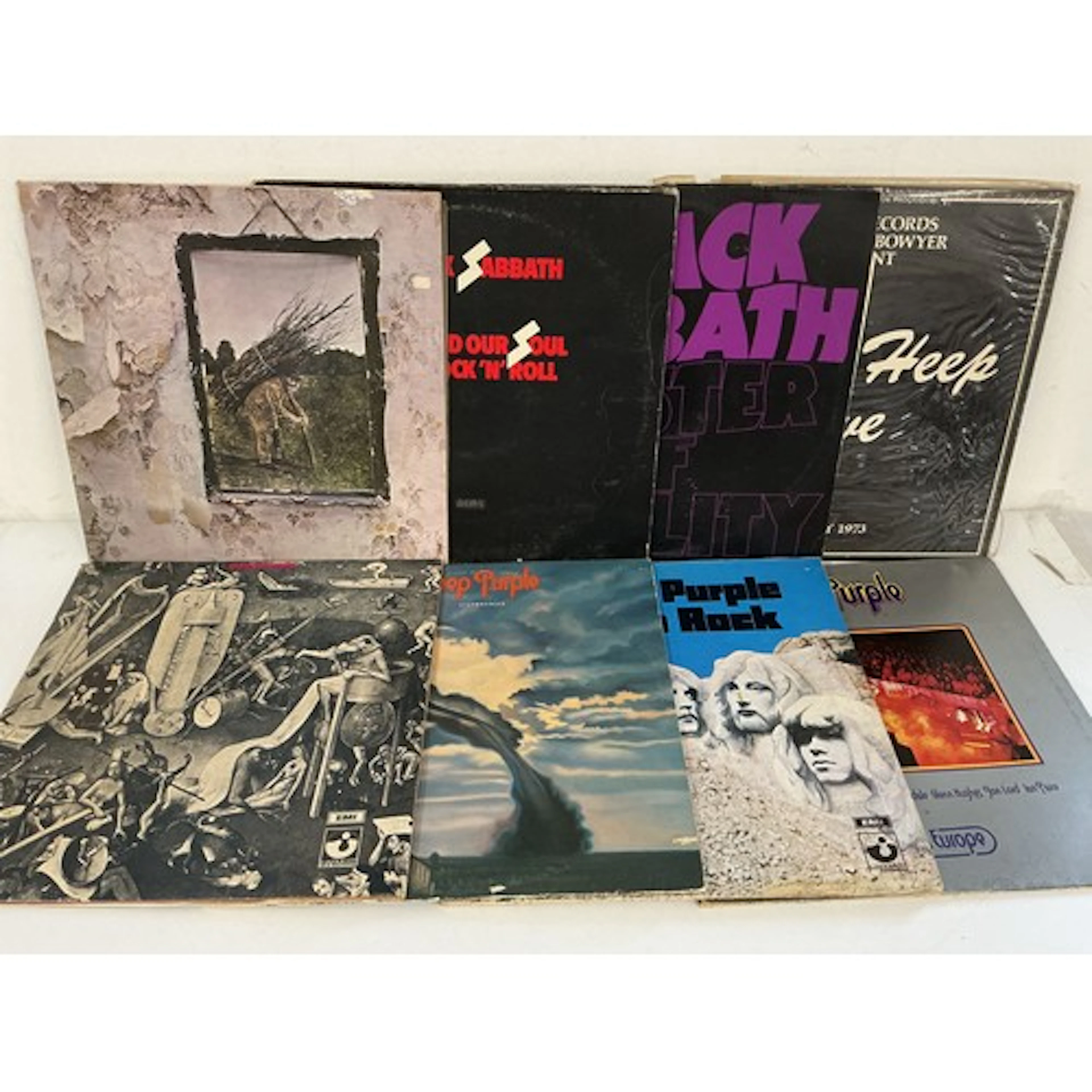 Two bags containing 16 rock LPs by various artists including...