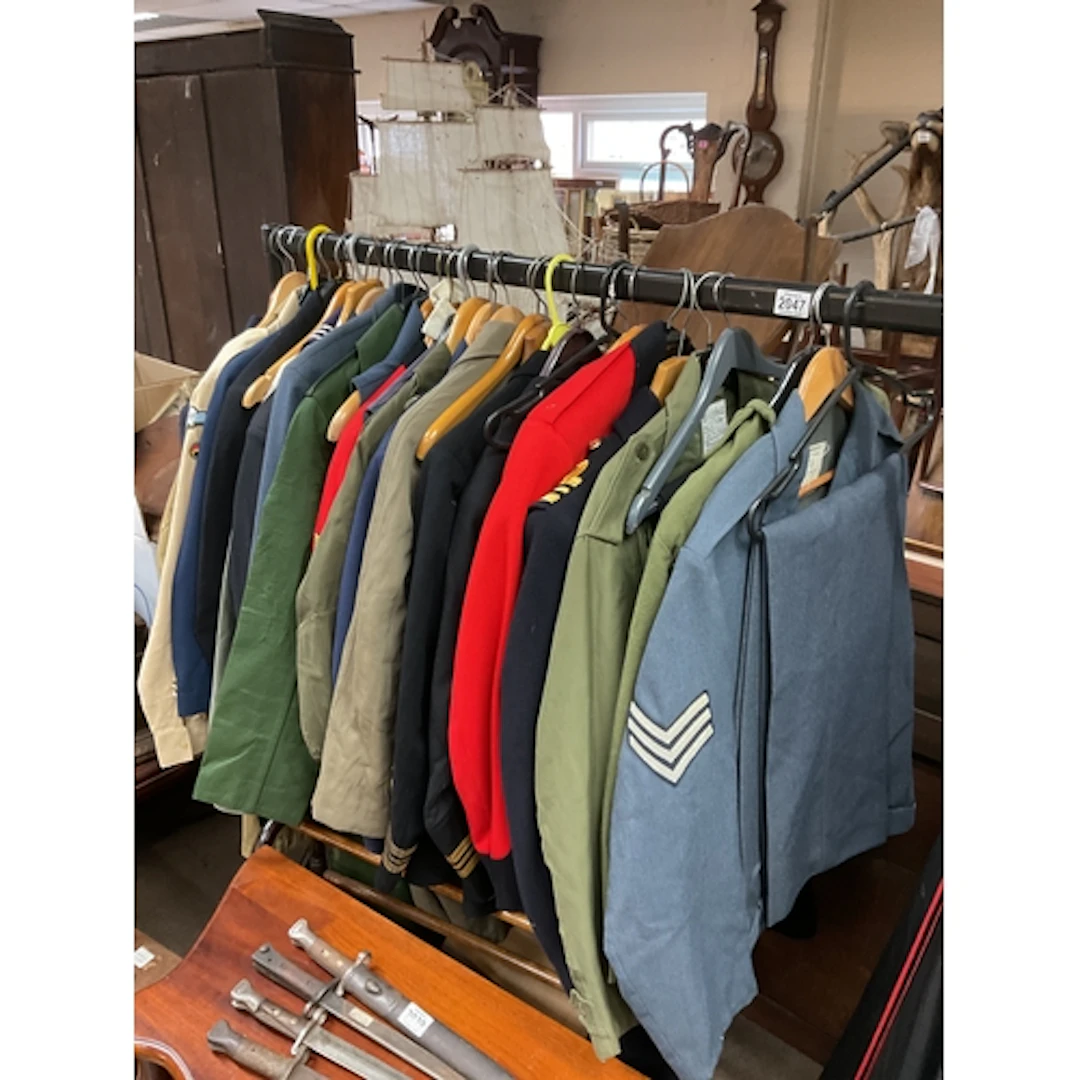 Mixture of post war tunics and trousers, UK, US, French etc.