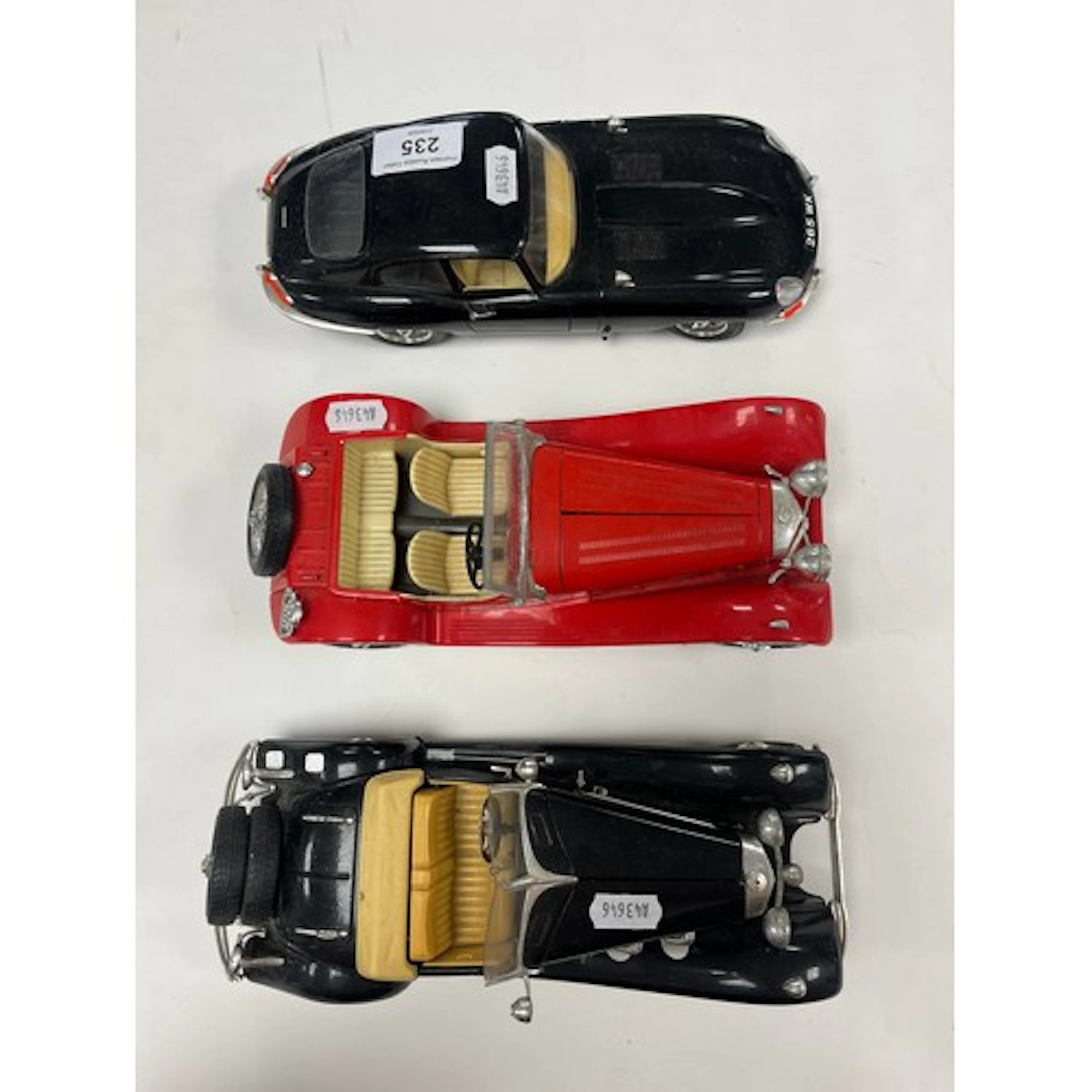 Three Burago model cars to include Jaguar "E" (1961), Jaguar...