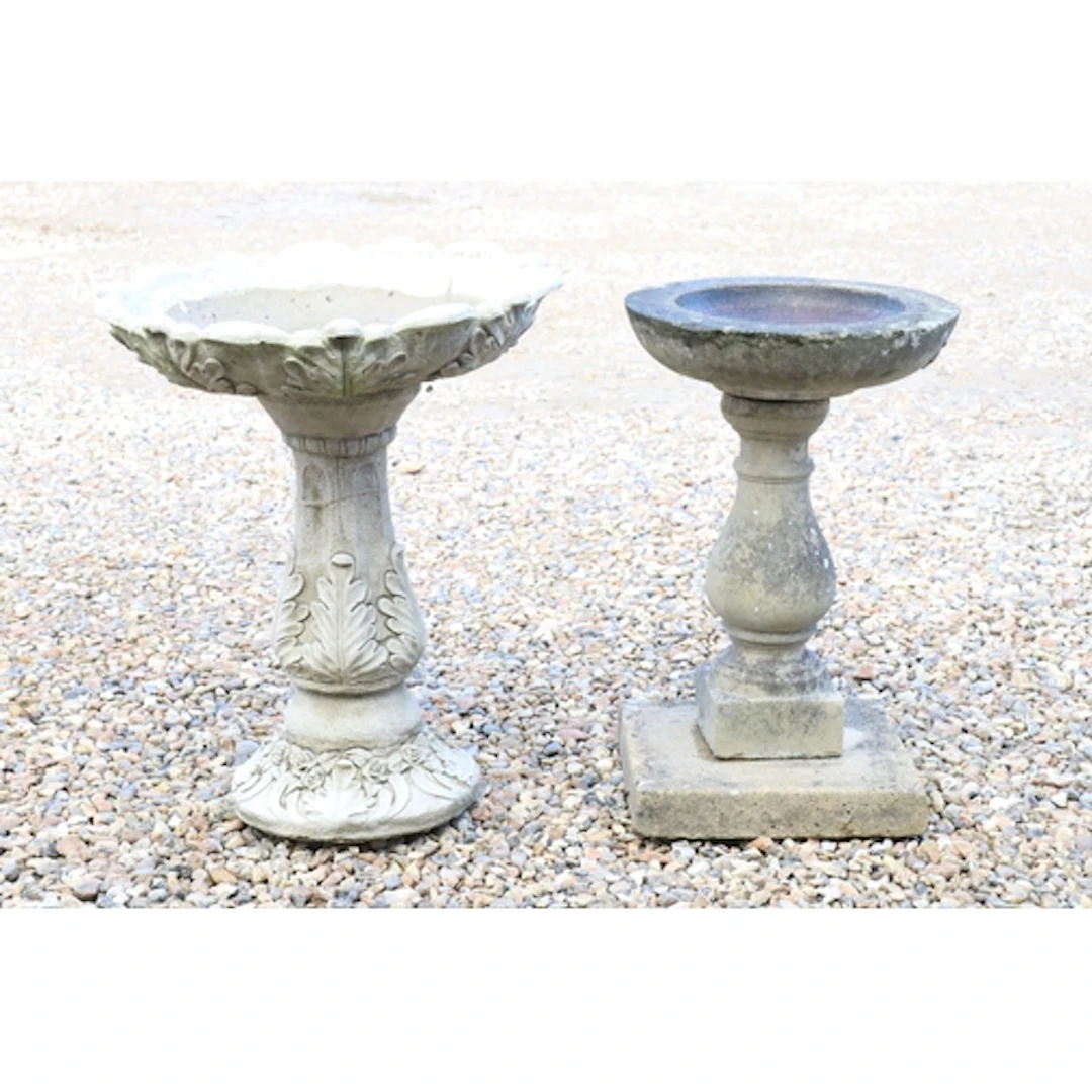 Two reconstituted stone bird baths to comprise one with foli...