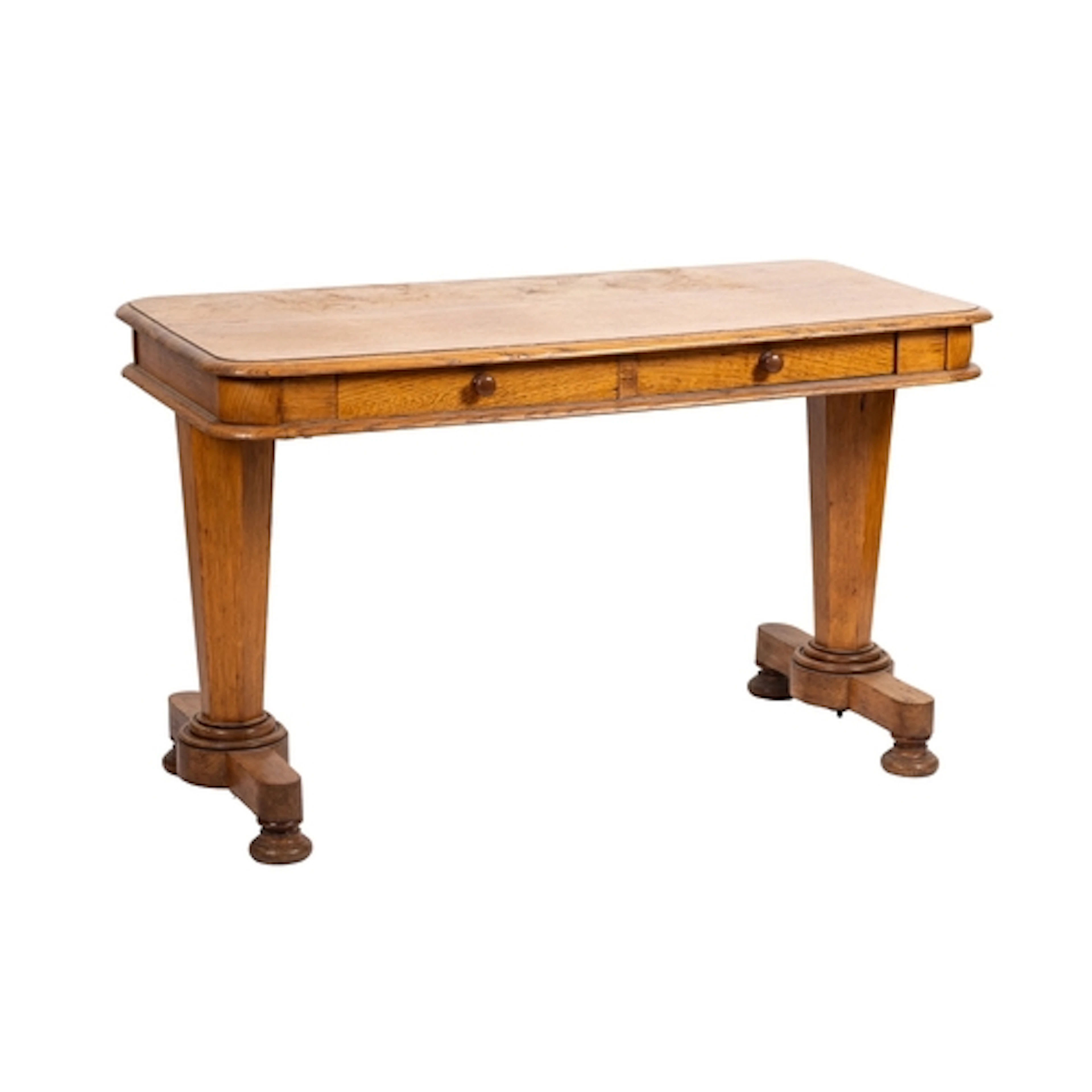 A George IV oak writing table, circa 1825; the rectangular t...