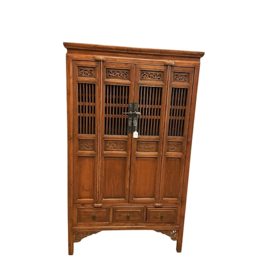 A 19th century Chinese provincial carved pine cupboard, widt...