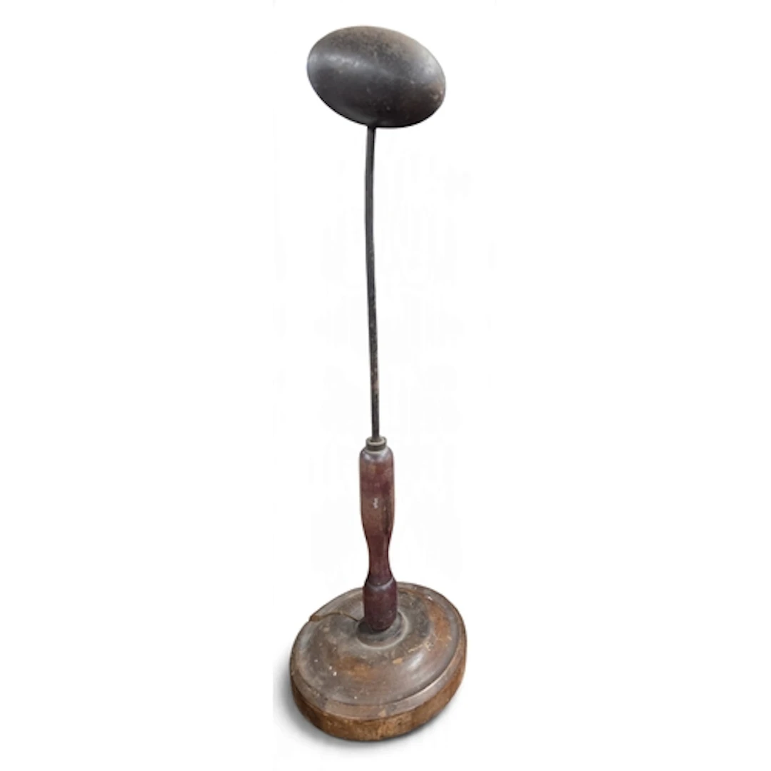 A 19th Century Hatters Egg Iron on stand. H 39 cm approx.
