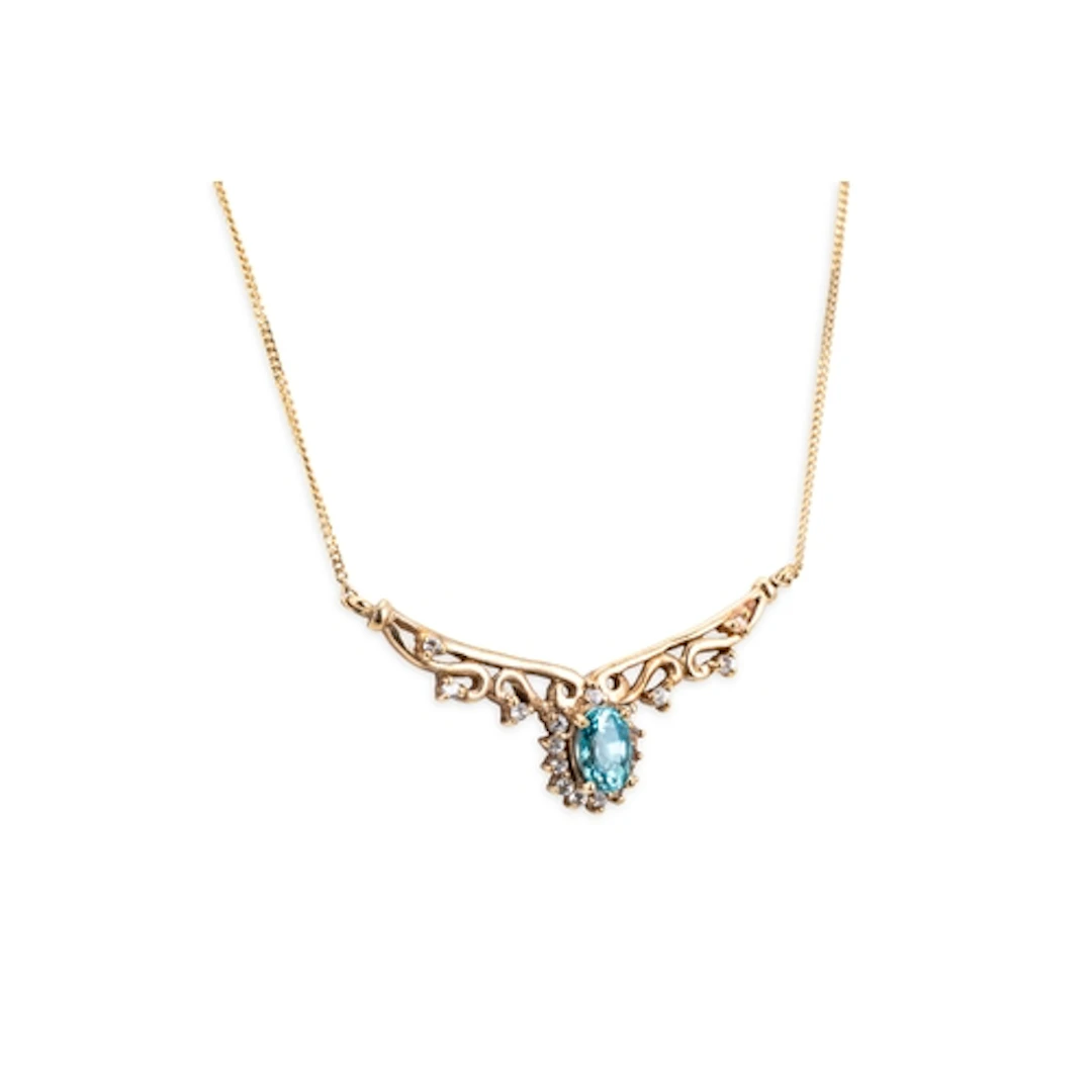A ZIRCON AND STONESET PENDANT, the oval zircon mounted in 9c...