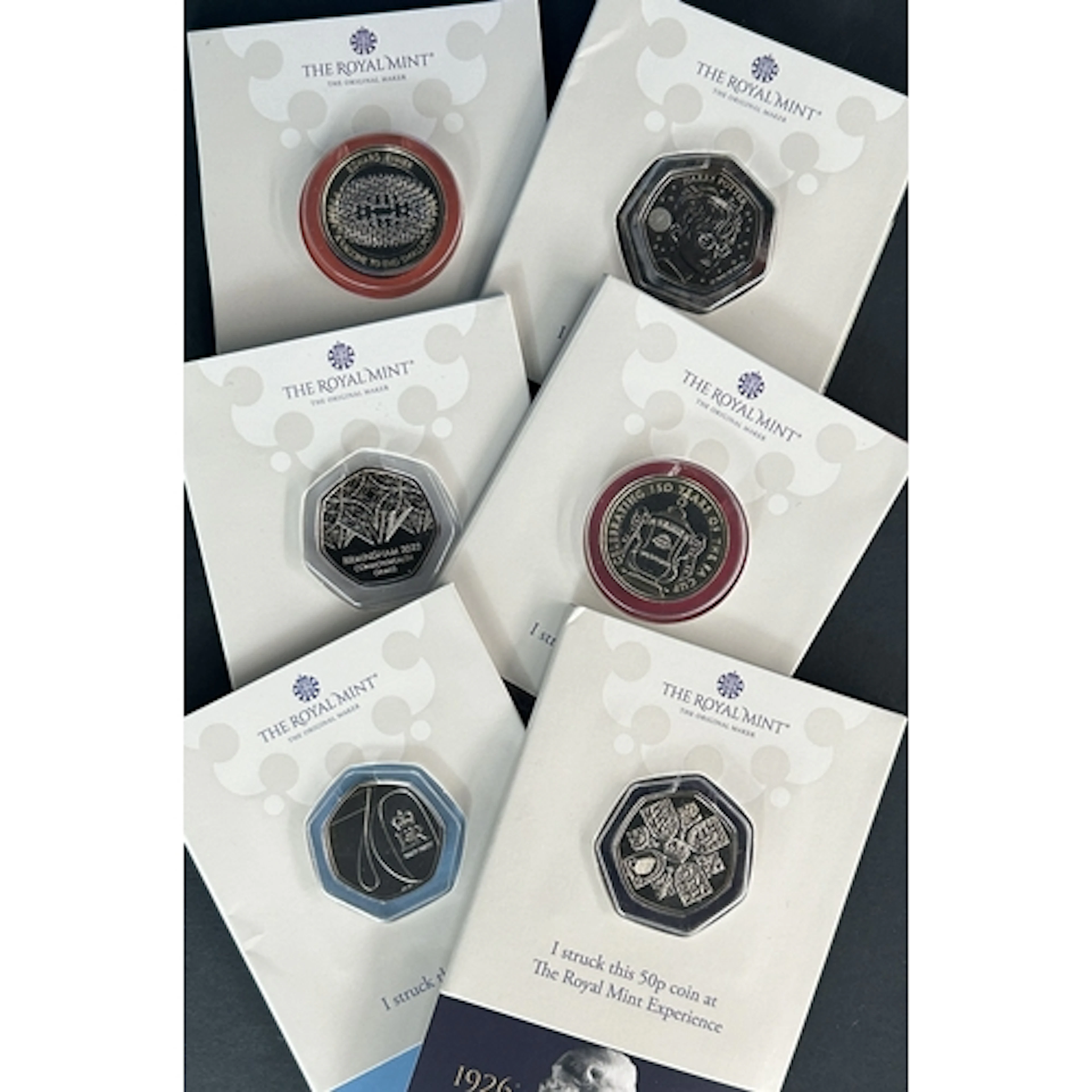 A group of six Great Britain Royal Mint Strike Your Own coin...