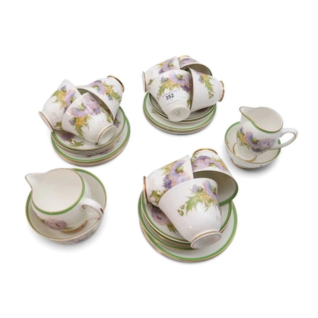 A Royal Doulton Glamis Thistle tea set designed by P Curnock...