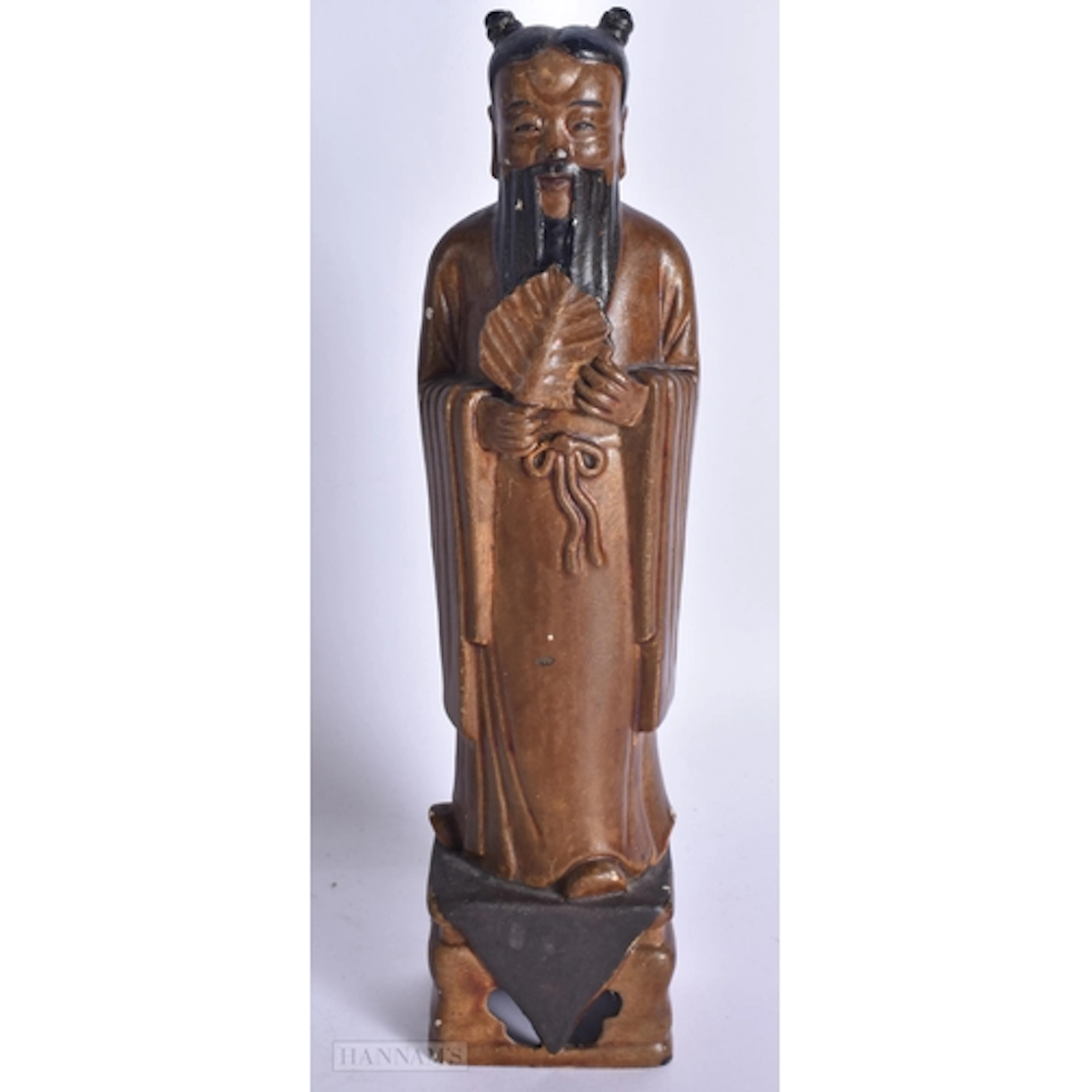 A CHINESE QING DYNASTY LACQUERED PORCELAIN FIGURE OF SAGE mo...