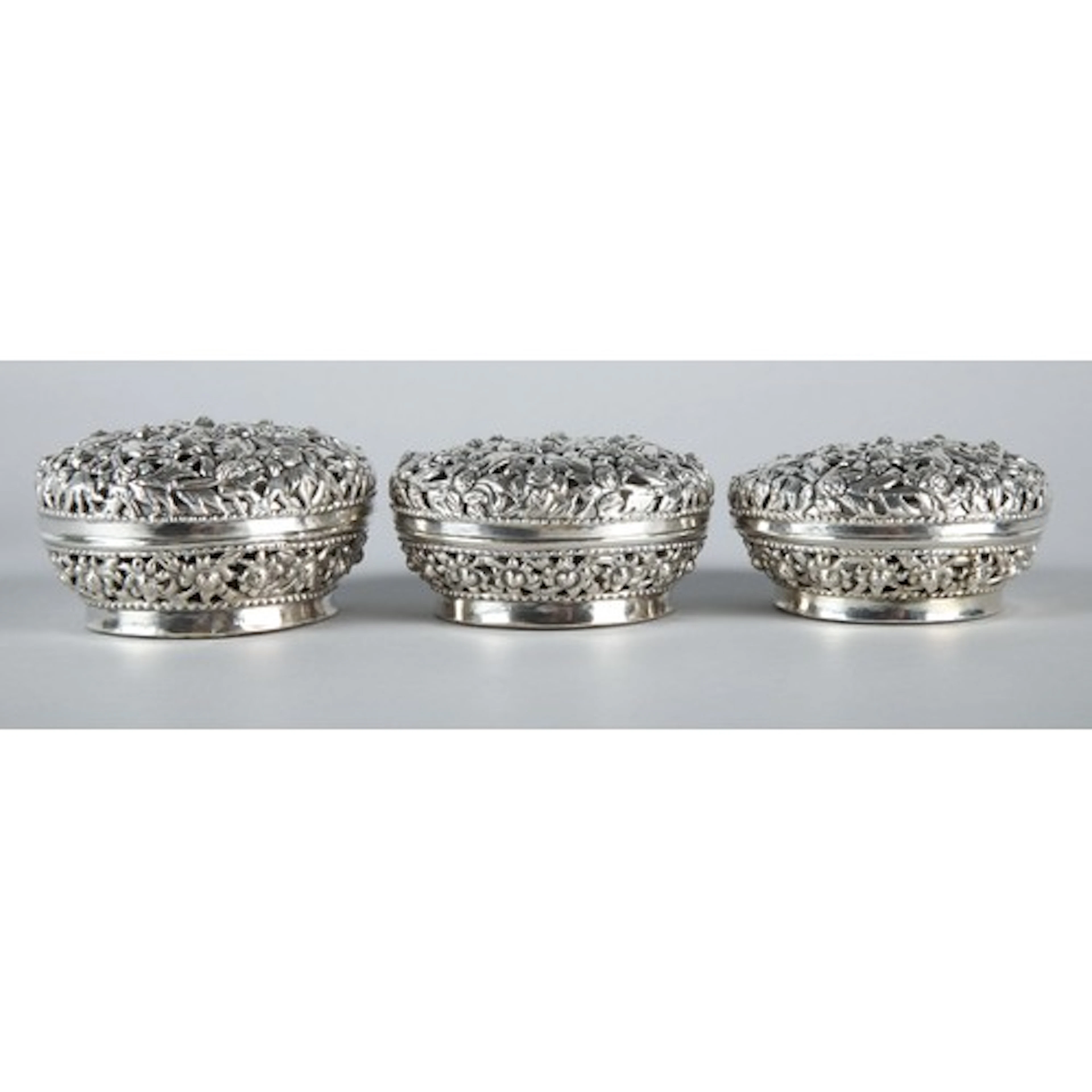 Three matching South Asian silver coloured Sri Lankan style ...