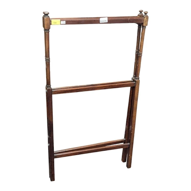 A 19th century Victorian mahogany towel rail of folding form...
