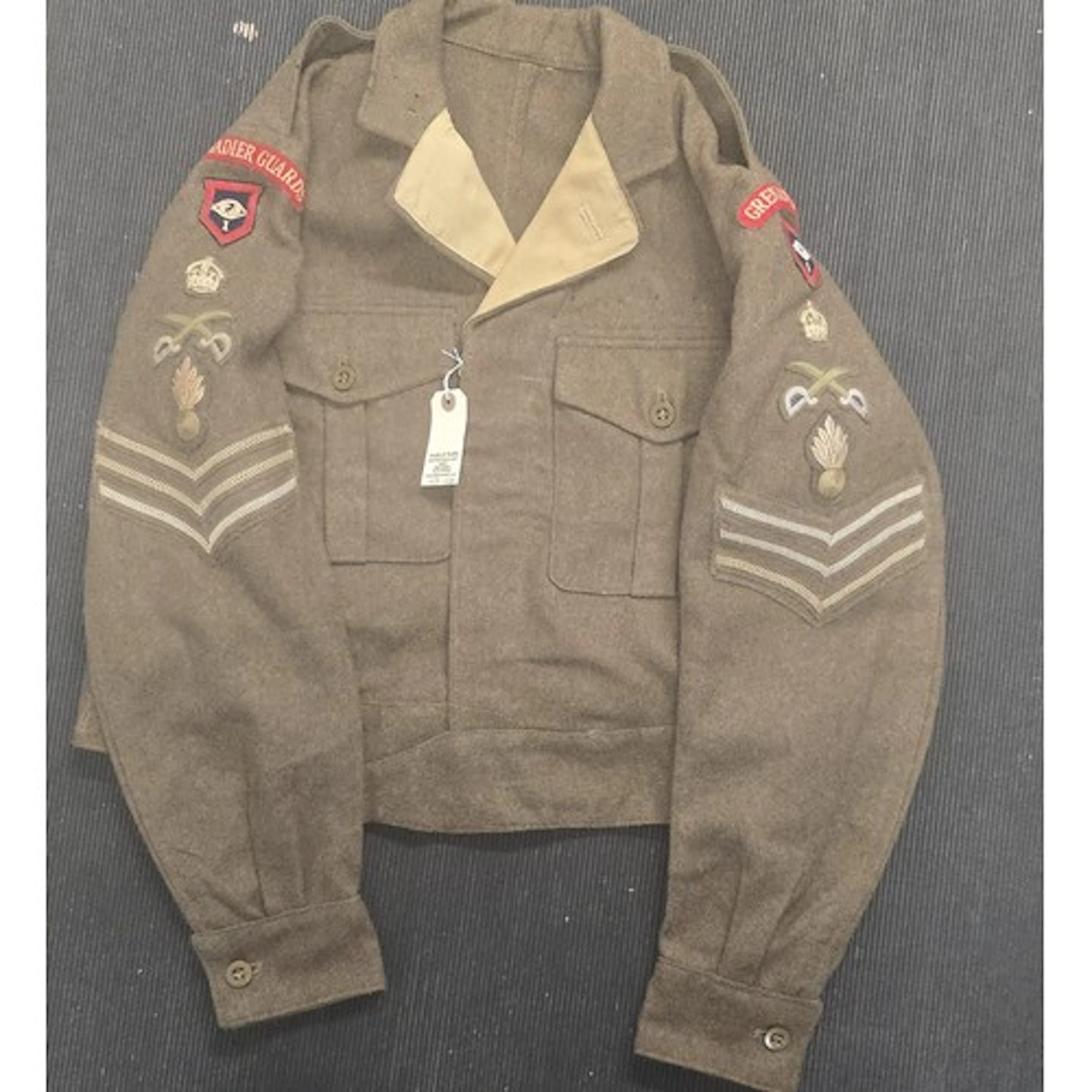 A 1949 pattern Grenadier Guards Sergeants Battle Dress Tunic...